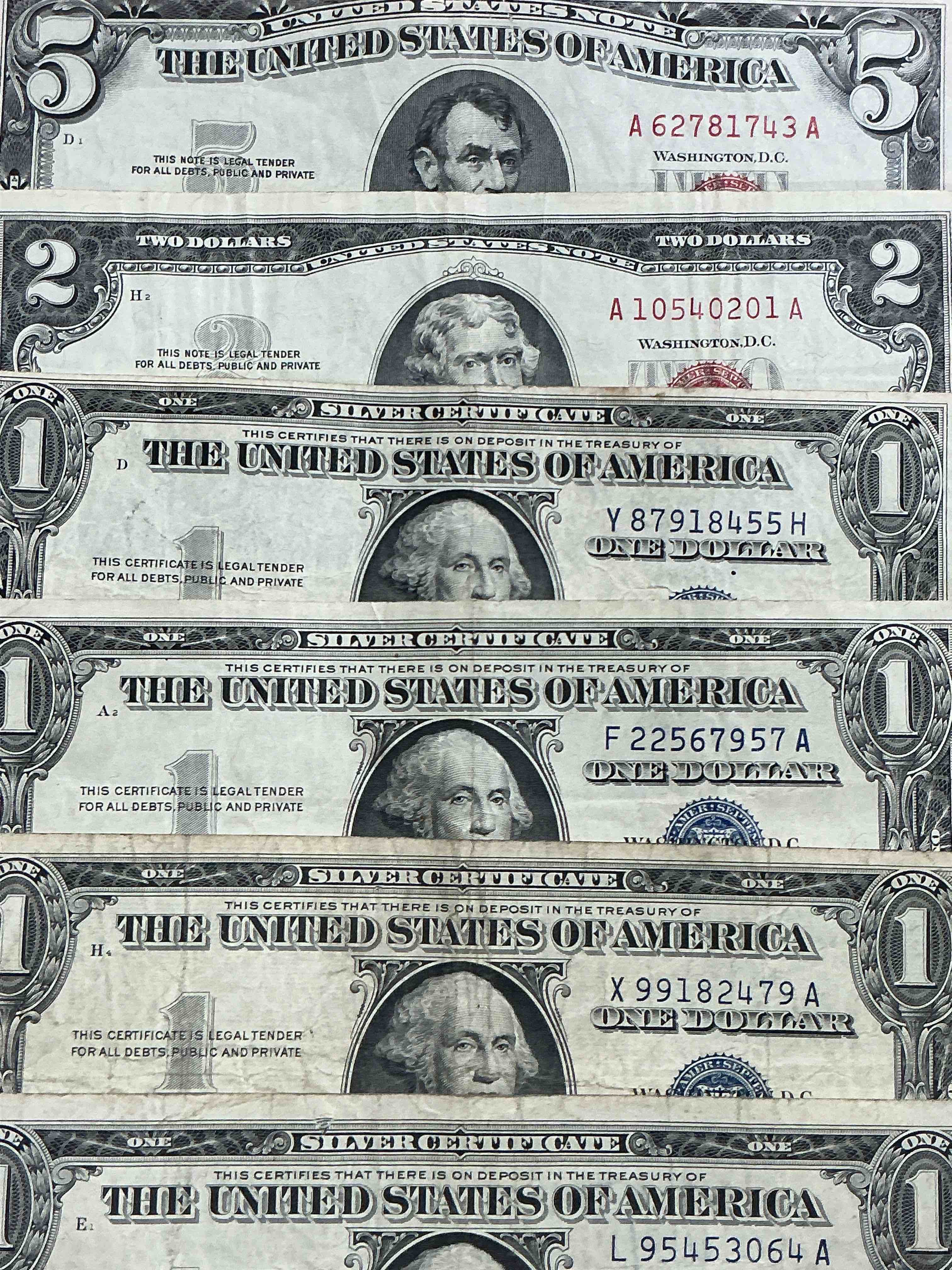 rare american dollar bills! red seal five dollar bill & red seal two dollar bill, along with silver certificates! five dollar bill ultra rare & in good condition, red seal two dollar bill in good condition & silver certificates produced from 1878 to 1964 & are still considered legal tender at face value. here are gorgeous, circulated 1935 & 1957 u.s. one dollar silver certificate, with highly collectible "blue seal!* own an awesome piece of history! american dollar lot! 