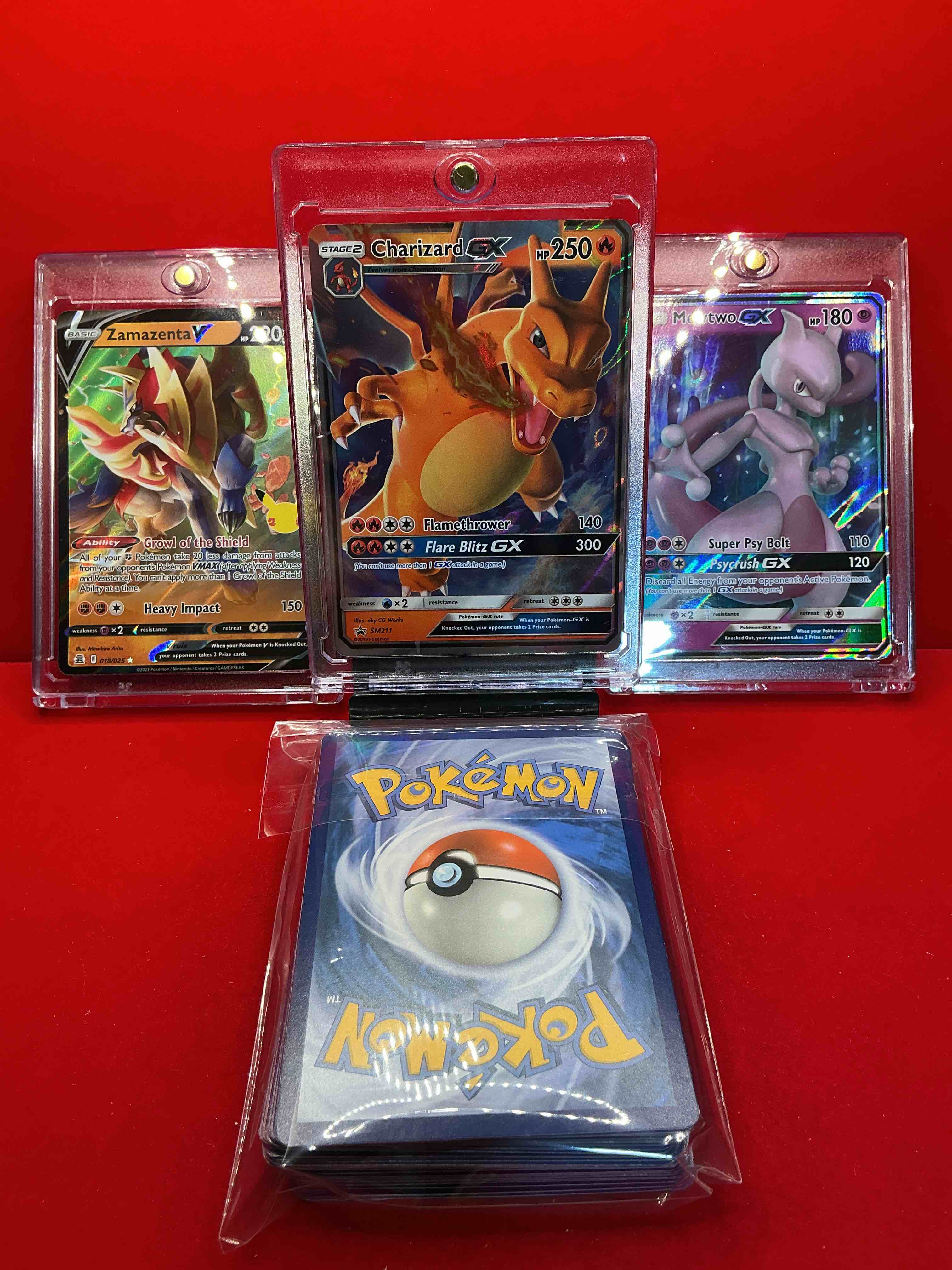 Condition photo showing New/Like New for pokémon palooza! charizard gx! mewtwo gx! zamazenta v! along with 50 other pokémon heroes, holos, legends & commons- including holographic cards, stage 2 cards, holos in all forms & more! also includes 36 non holo common/ uncommon basic & first stage cards trainers & energy too! perfect set for collectors & enthusiasts!