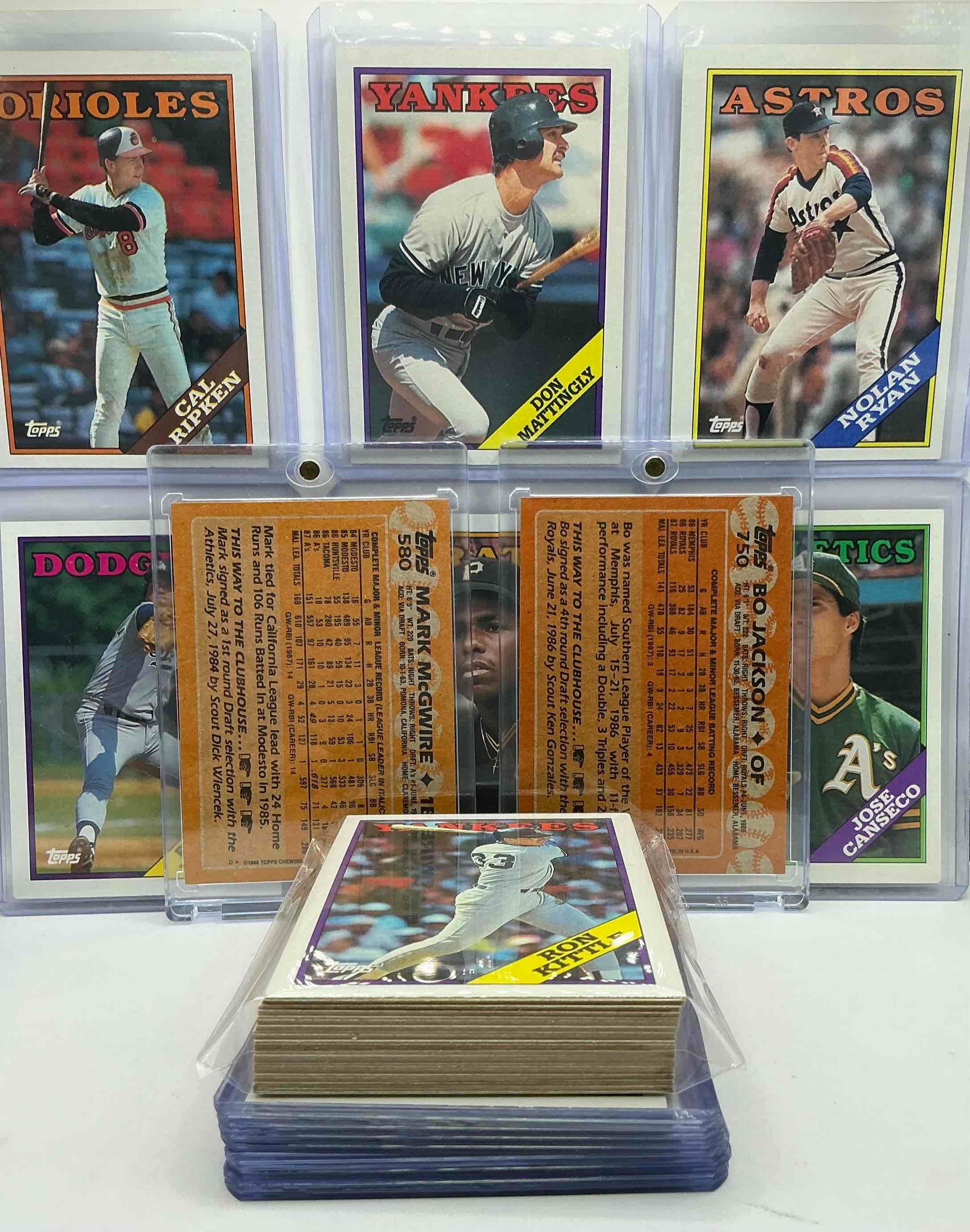 Condition photo showing New/Like New for mark mcgwire topps all star rookie card! 1988 topps baseball cards… some of the best players to ever play the game! bo jackson, don mattingly, mark mcgwire, nolan ryan, cal ripken, barry bonds, bobby bonilla & more! insane 50 card lot, heroes & commons!