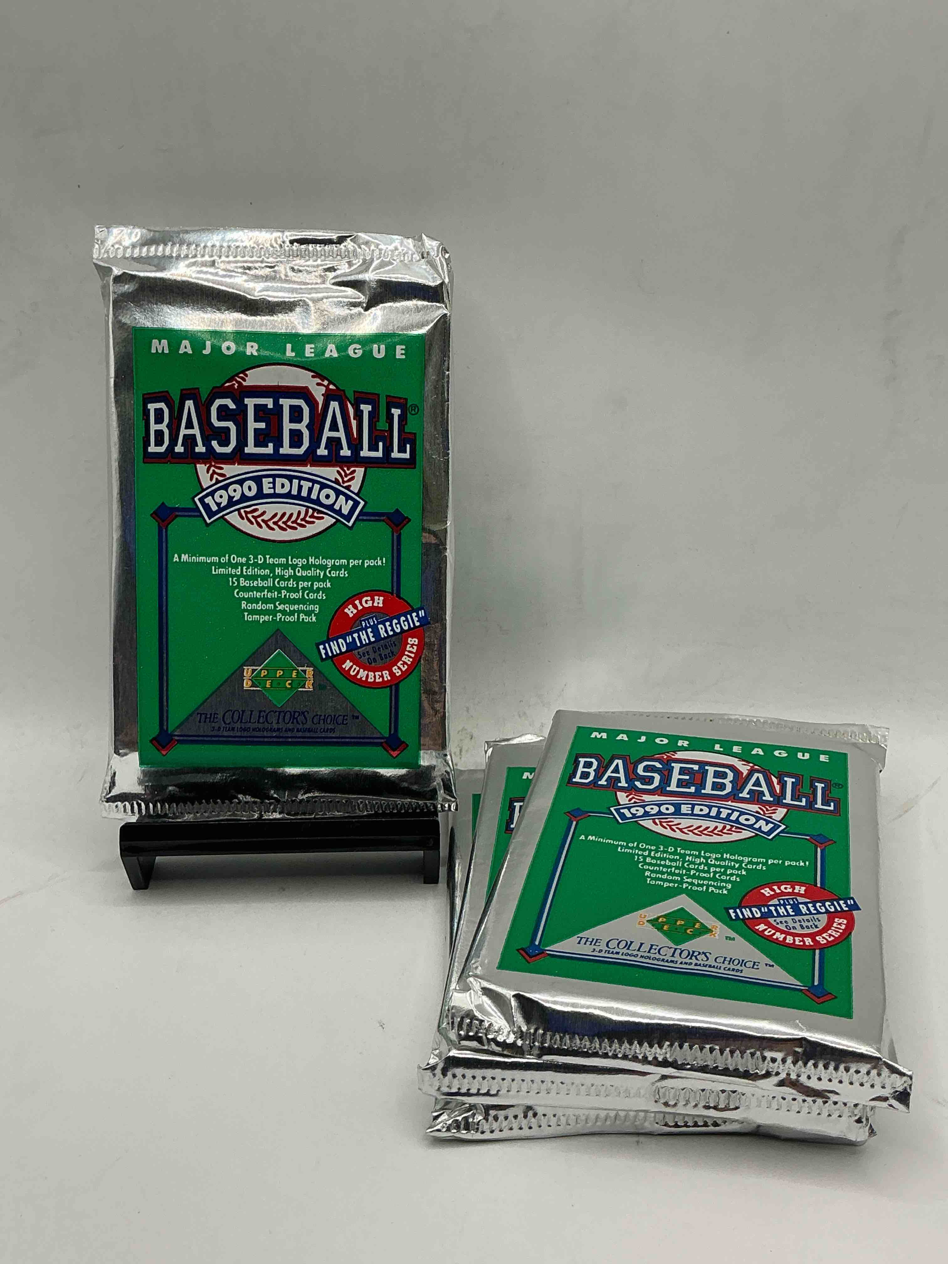 1990 upper deck baseball high series, search for reggie, unopened sports trading card packs! direct from original box! look for the valuable “find the reggie” card! as well as early ken griffey jr. cards!