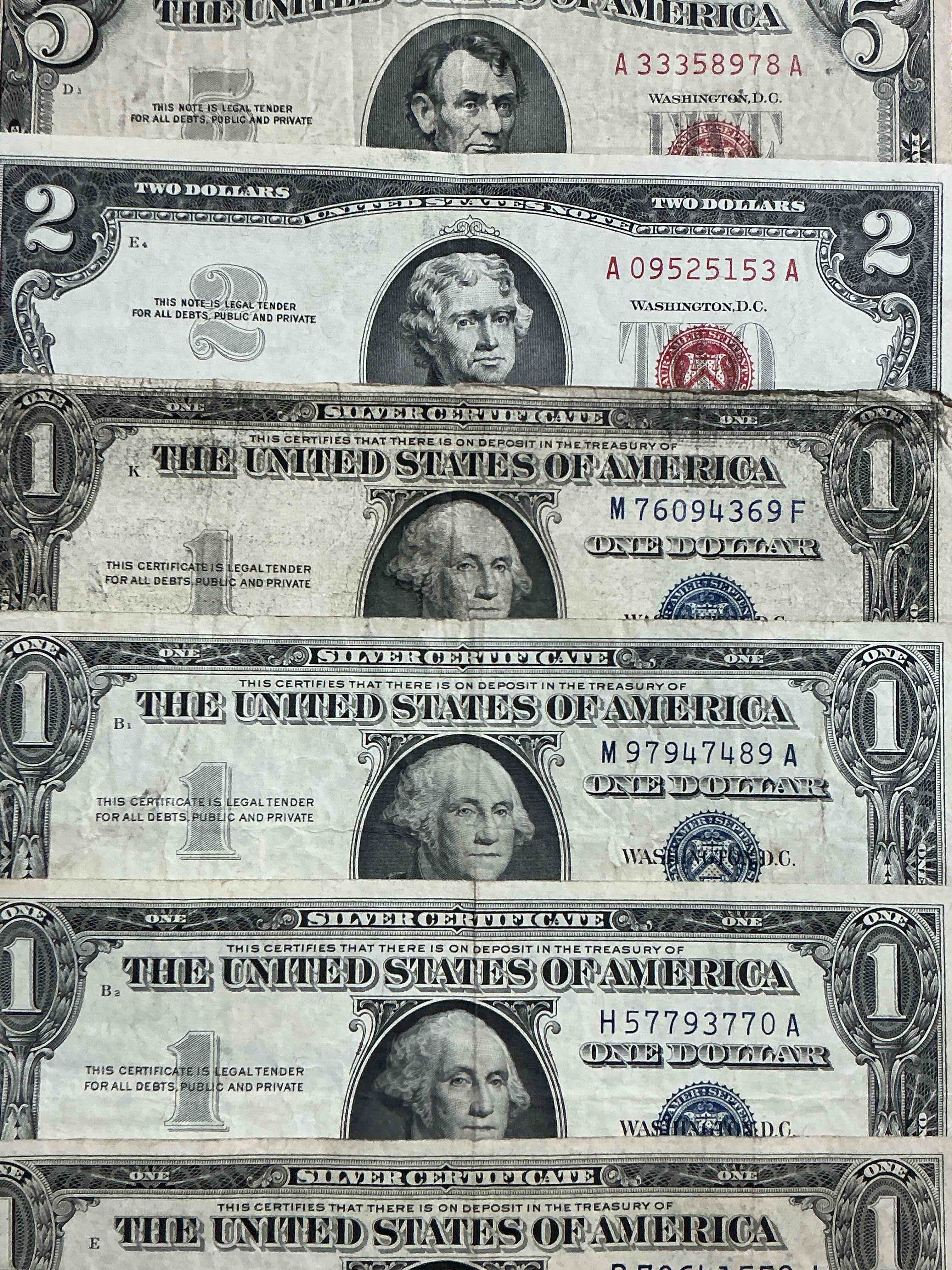 rare american dollar bills! red seal five dollar bill & red seal two dollar bill, along with silver certificates! five dollar bill ultra rare & in good condition, red seal two dollar bill in good condition & silver certificates produced from 1878 to 1964 & are still considered legal tender at face value. here are gorgeous, circulated 1935 & 1957 u.s. one dollar silver certificate, with highly collectible "blue seal!* own an awesome piece of history! american dollar lot! 