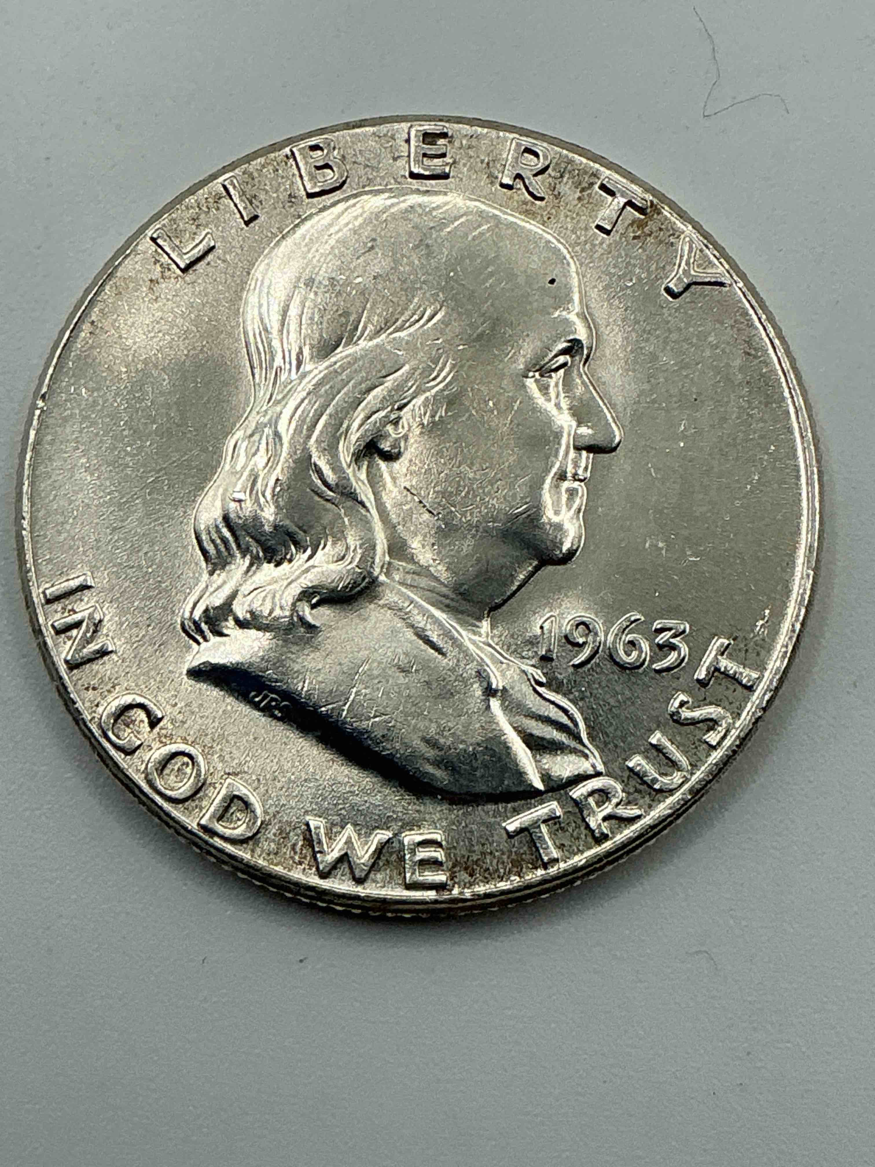 ben franklin silver! pre 1965 silver u.s. half dollar coin! before 1965 american half dollars were actually silver, here is a rare 1963 version in good condition! great for investing in precious metals! these heavy half dollars were minted at 90% silver and 10% copper, giving them a net weight of .36169 ounces of pure silver per coin! very rare in this great condition!