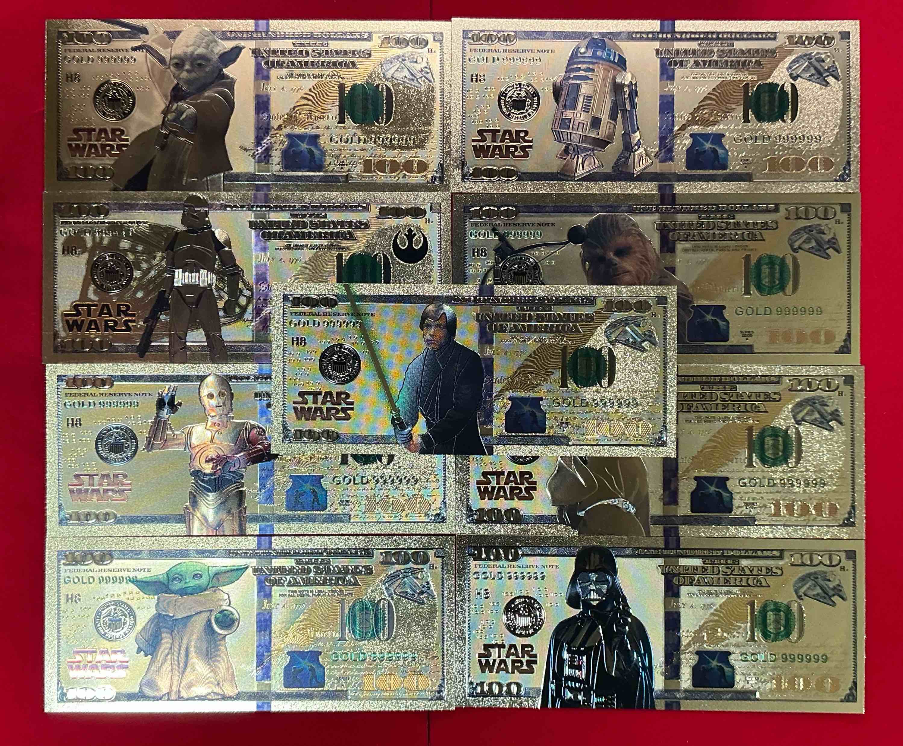 star wars novelty gold-in-color dollars! super cool collectables! luke skywalker, darth vader, yoda, baby yoda, storm trooper, r2d2, c3po, chewbacca & princess leia! awesome!