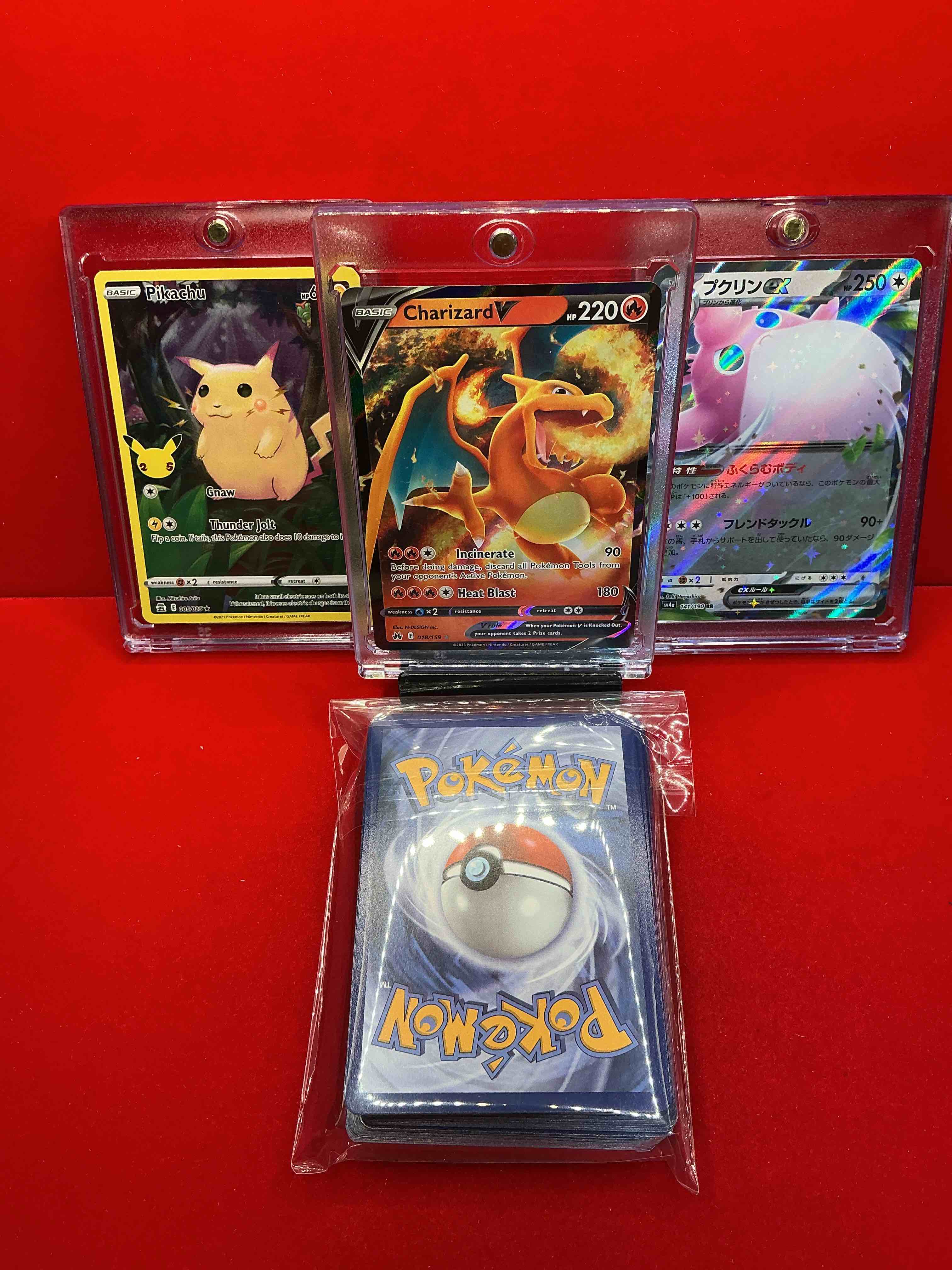 Condition photo showing New/Like New for pokémon pack! charizard v! pikachu(full art!) along with 50 other pokémon heroes, holos, legends & commons- including holographic cards, stage 2 cards, holos in all forms & more! also includes 36 non holo common/ uncommon basic & first stage cards trainers & energy too! perfect set for collectors & enthusiasts!