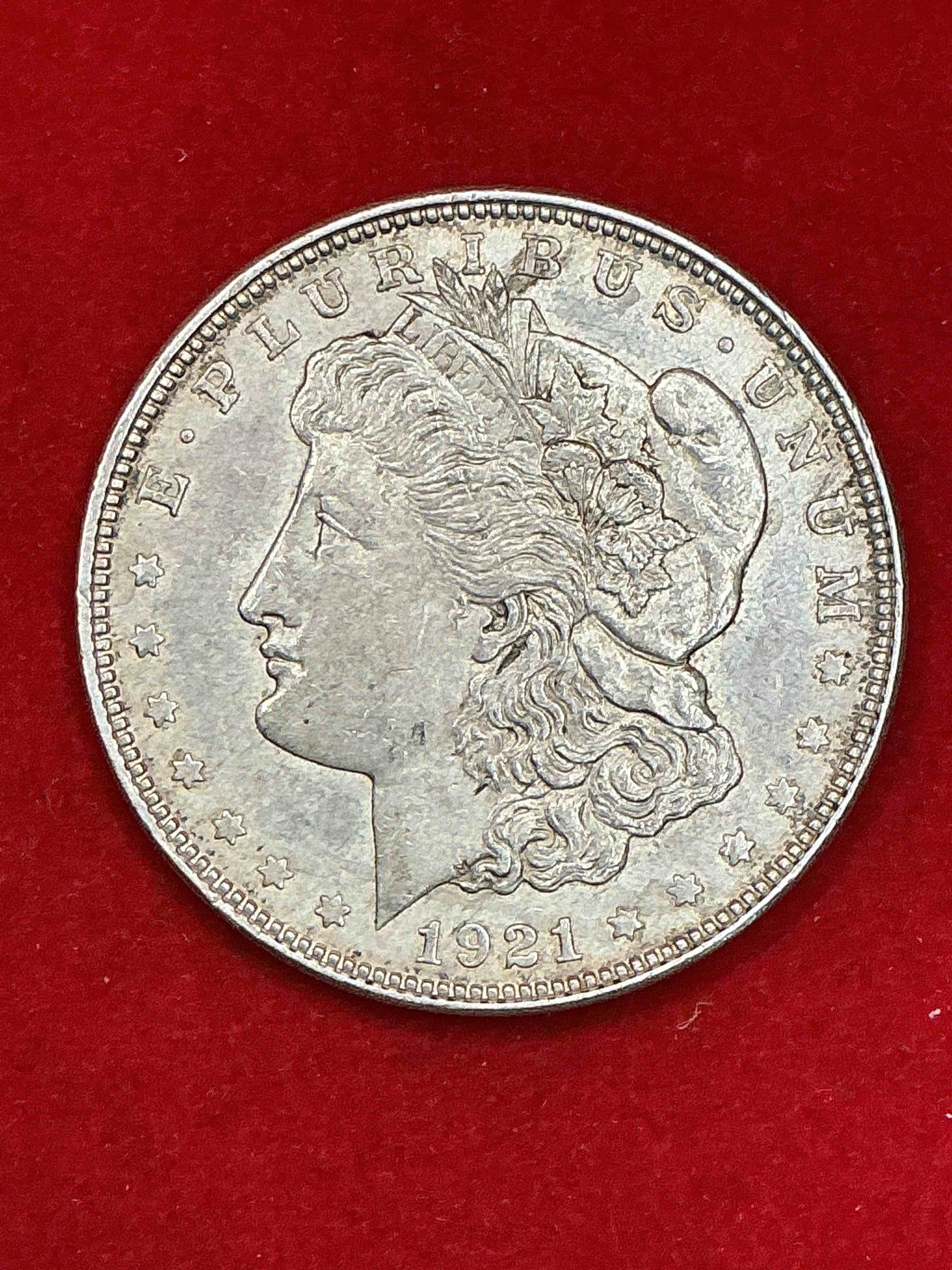 silver peace dollar! one dollar coin from 1921! these one ounce coins are 90% silver & super rare! liberty peace dollars are highly coveted by collectors for their value & beautiful design. add a one ounce liberty peace dollar at 90% silver to your collection! super rare! (dime in picture used for size reference only, not included)