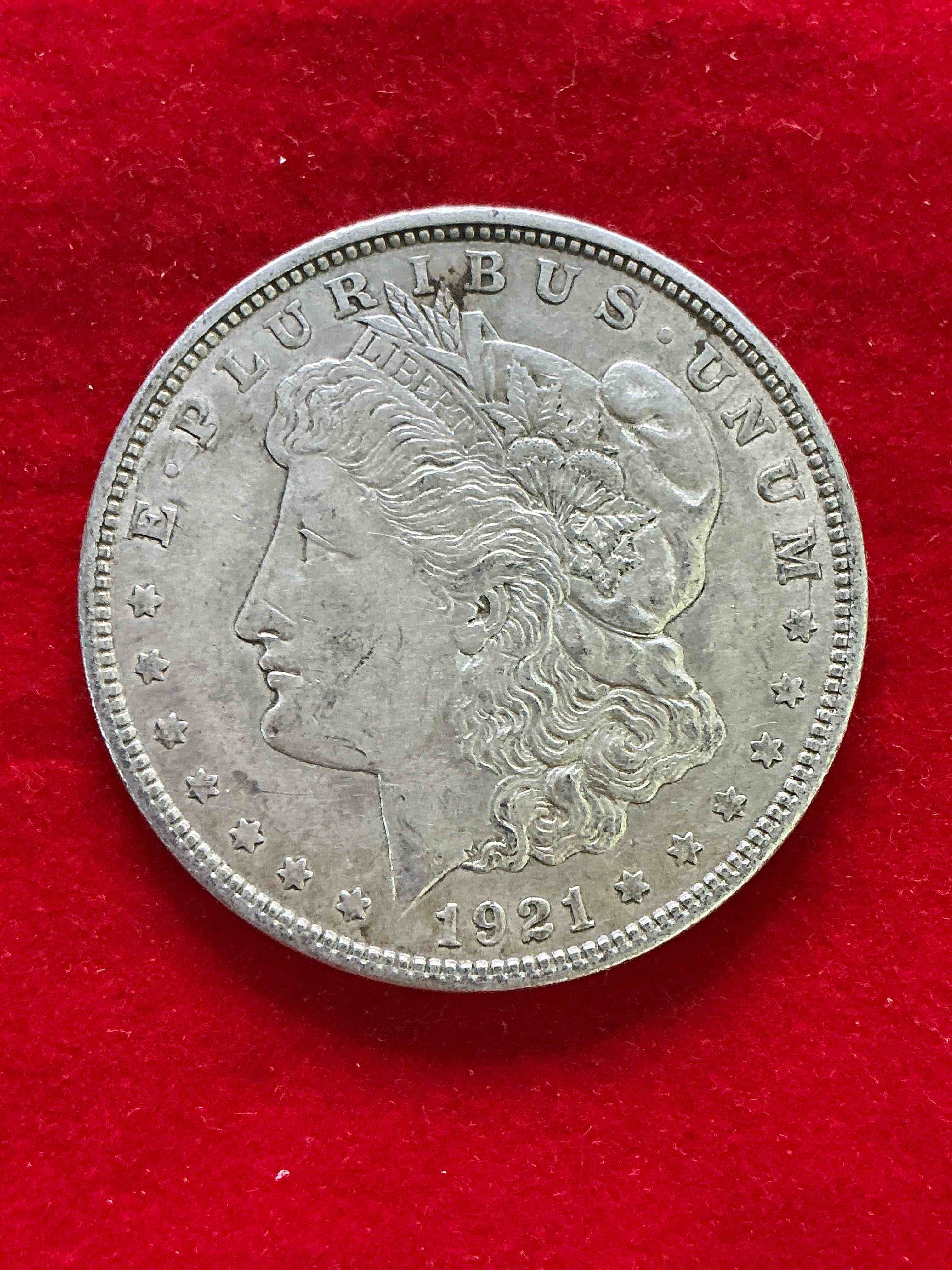 silver peace dollar! one dollar coin from 1921! these one ounce coins are 90% silver & super rare! liberty peace dollars are highly coveted by collectors for their value & beautiful design. add a one ounce liberty peace dollar at 90% silver to your collection! super rare! (dime in picture used for size reference only, not included)