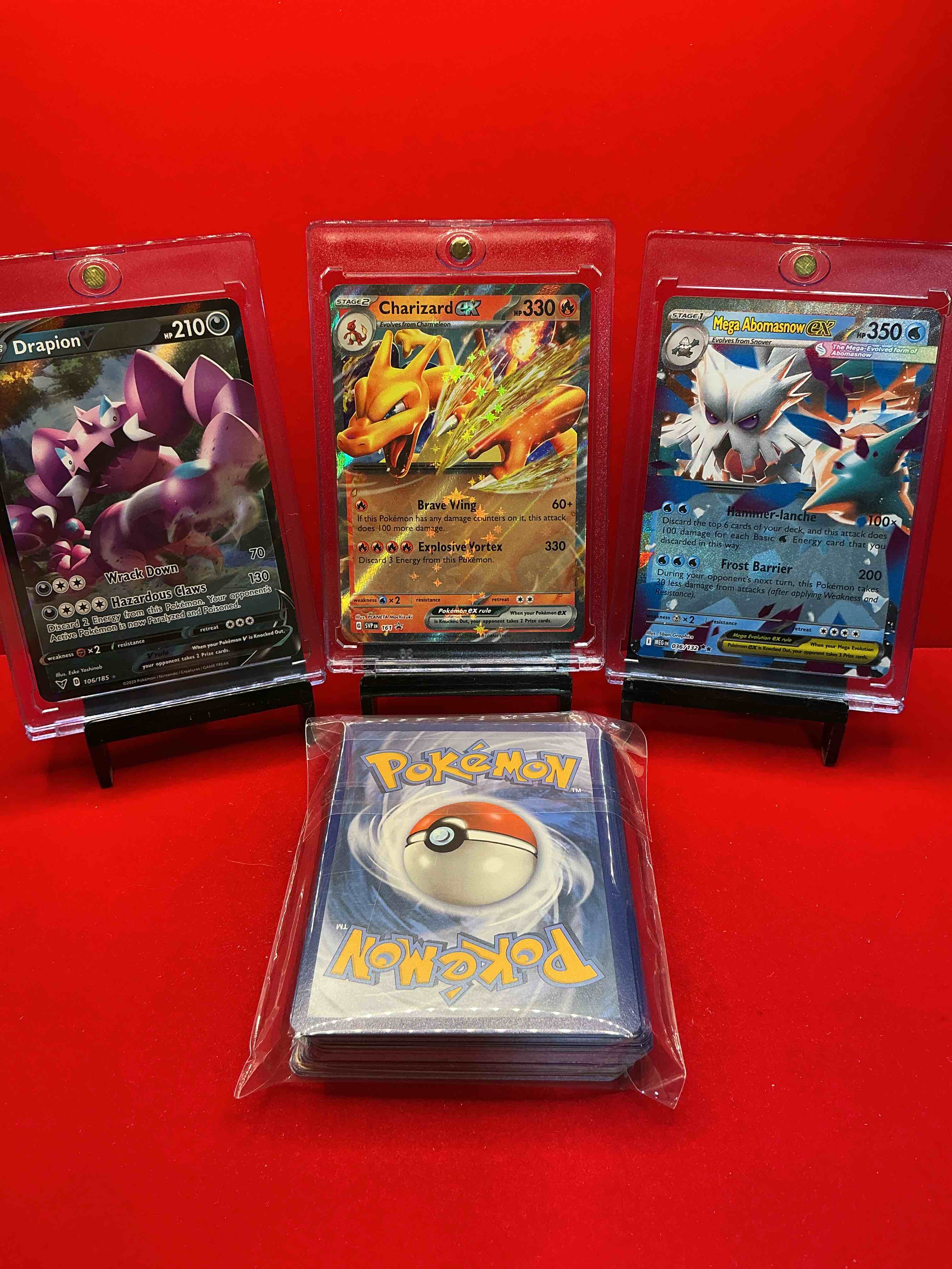Condition photo showing New/Like New for pokémon!! charizard ex! mega abomasnow ex! drapion v! along with 50 other pokémon heroes, holos, legends & commons- including holographic cards, stage 2 cards, holos in all forms & more! also includes 36 non holo common/ uncommon basic & first stage cards trainers & energy too! perfect set for collectors & enthusiasts!
