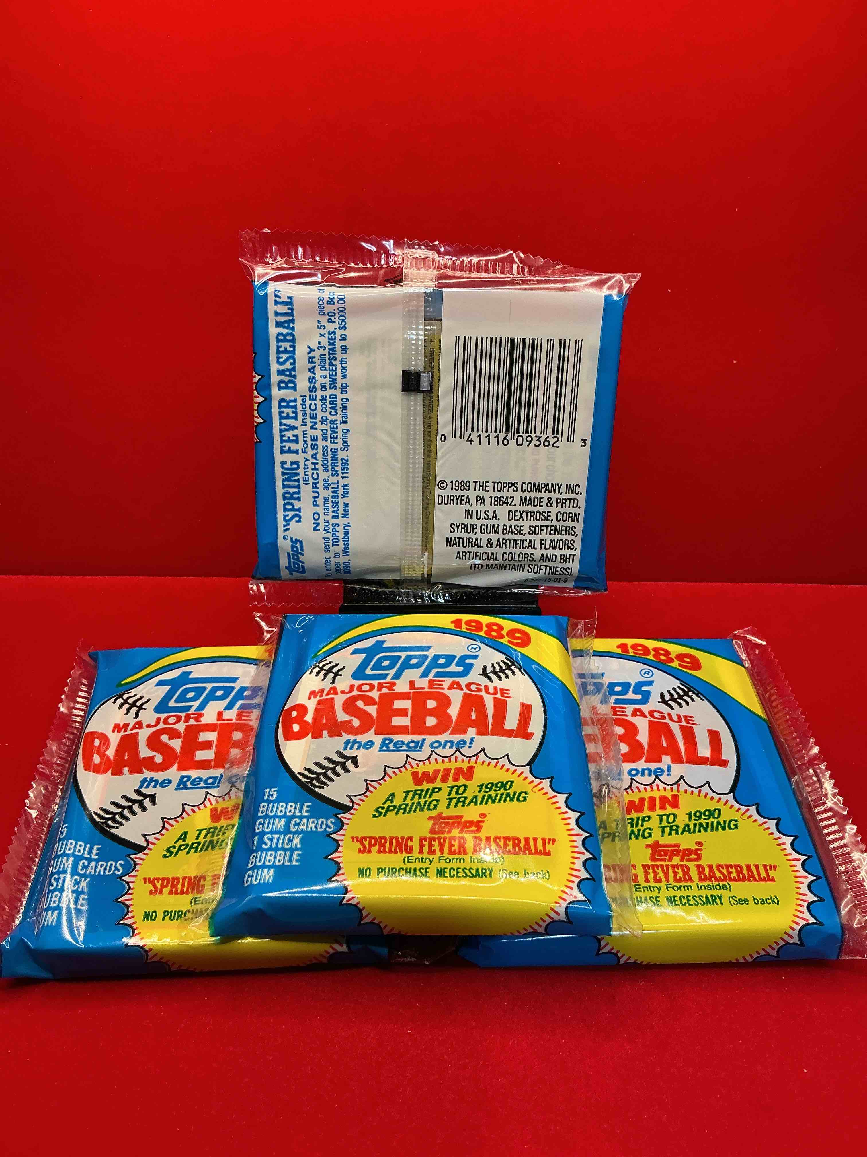 Condition photo showing New/Like New for john smoltz & randy johnson rookies!? 1989 topps baseball unopened sports card cello packs! direct from original retail case! search for valuable ken griffey jr. & randy johnson rookie cards as well as valuable bo jackson