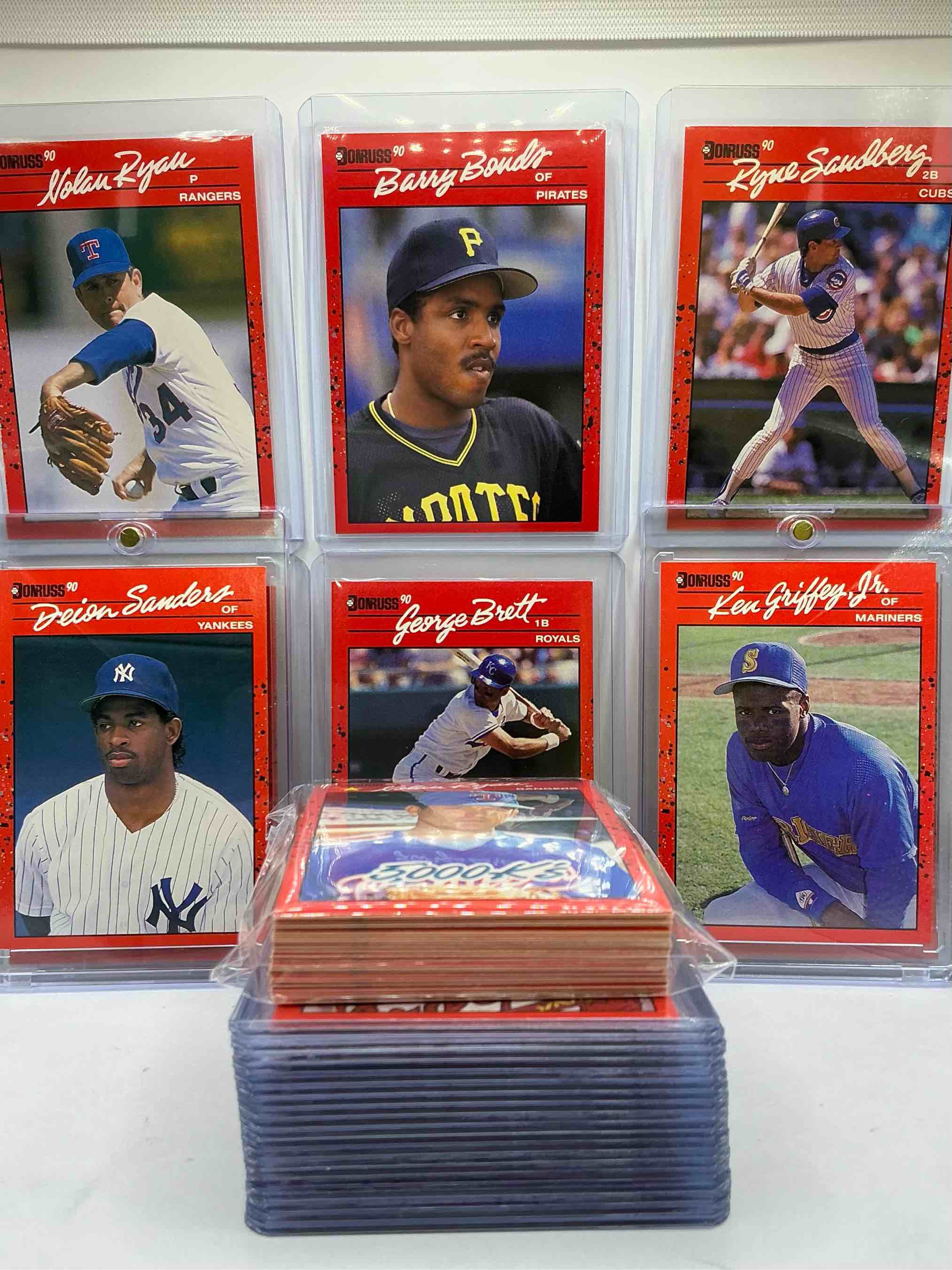 Condition photo showing New/Like New for (set of 50) 1990 donruss baseball card craziness! ken griffey jr, deion sanders, randy johnson, barry bonds, john smoltz, kirby puckett, tom glavine, rickey henderson, don mattingly, cal ripken, wade boggs, doc gooden, greg maddux, fernando valenzuela, nolan ryan, roger clemens, george brett, tony gwynn & more! the best players from the time! super rare set with all of these stars! 50 card craziness! legends, heroes & commons!