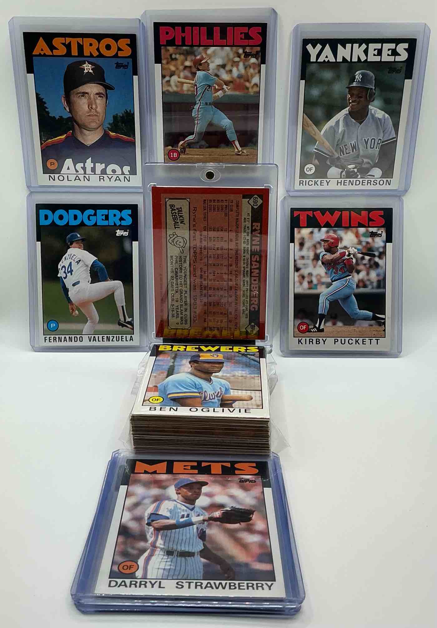 Condition photo showing New/Like New for 1986 topps baseball 50 card craziness! the biggest names in baseball from the decade! pete rose, nolan ryan, roger clemens, don mattingly, darryl strawberry, tim raines, wade boggs, ryne sandberg, cal ripken, rickey henderson & more!these cards are getting more & more rare by the day, don't miss this opportunity to have these rare 1986 baseball cards filled with baseball legends!