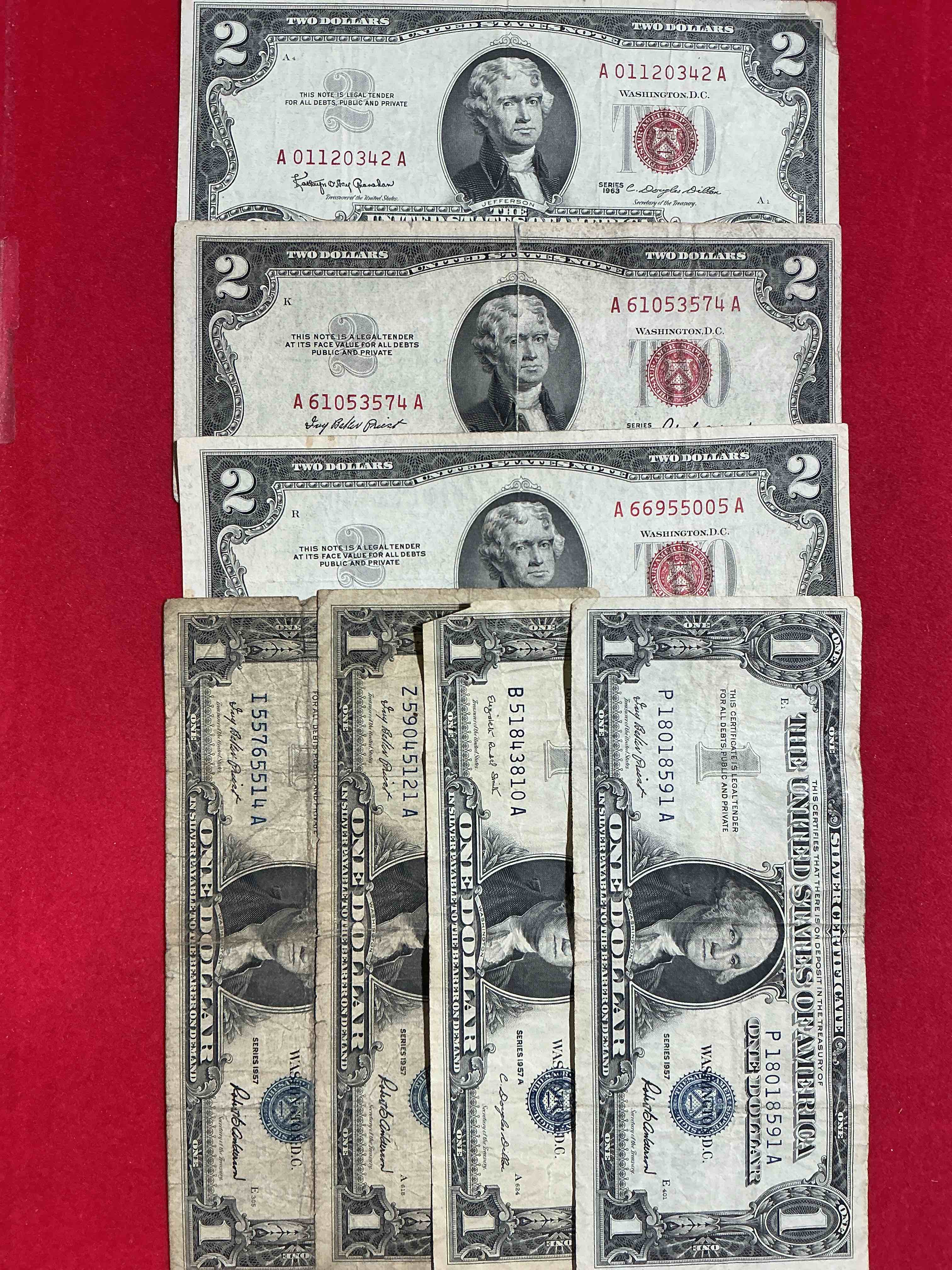 rare american dollar bills! red seal two dollar bills, along with silver certificates! five dollar bill ultra rare & in good condition, red seal two dollar bill in good condition & silver certificates produced from 1878 to 1964 & are still considered legal tender at face value. here are gorgeous, circulated 1935 & 1957 u.s. one dollar silver certificate, with highly collectible "blue seal!* own an awesome piece of history! american dollar lot! 