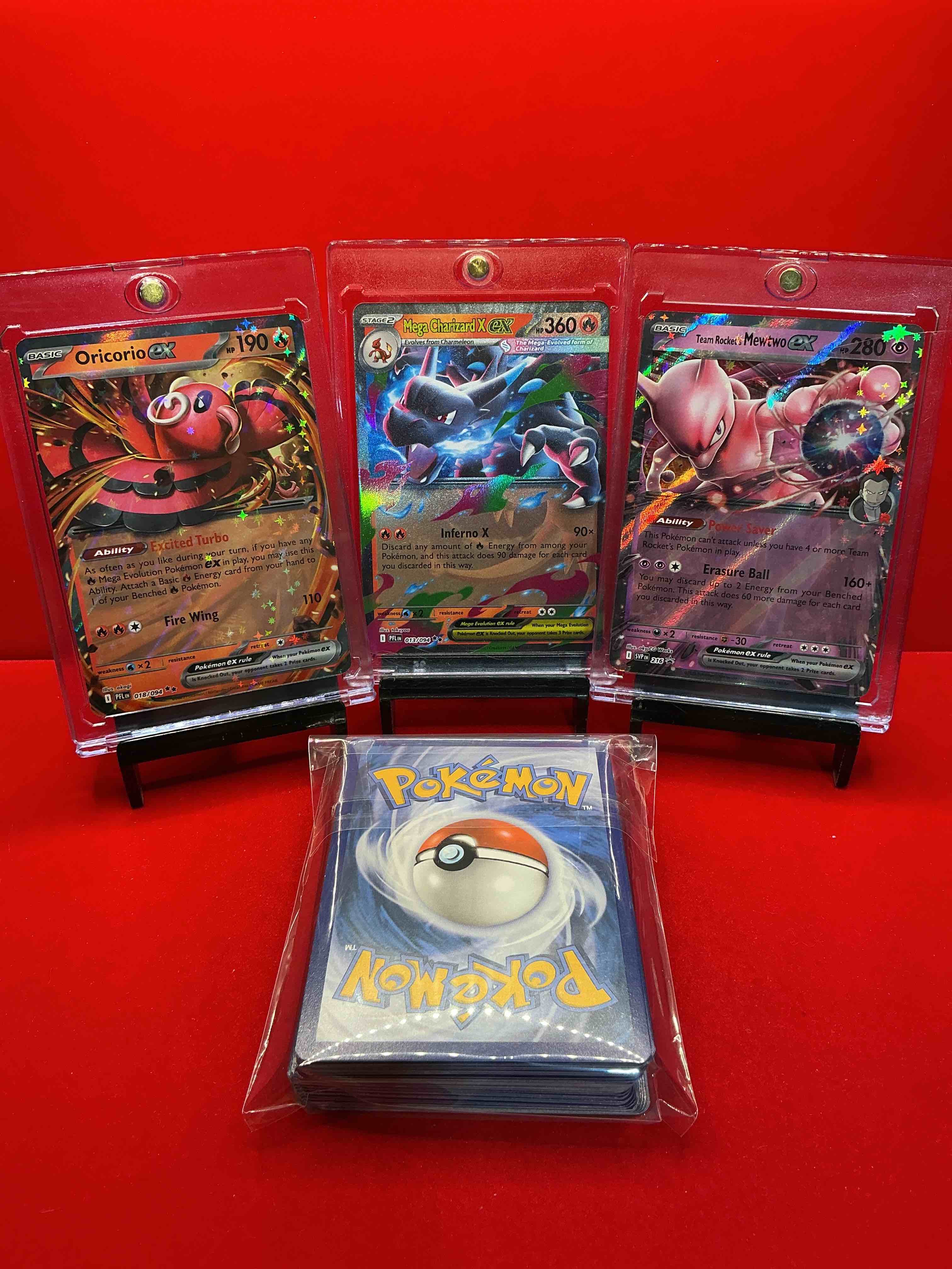 Condition photo showing New/Like New for pokémon pack! mega charizard x ex! mewtwo ex! oricorio ex! along with 50 other pokémon heroes, holos, legends & commons- including holographic cards, stage 2 card, holos in many forms & more! also includes non holo common/ uncommon basic & first stage cards & maybe even trainers & energy too! perfect set for collectors & enthusiasts!