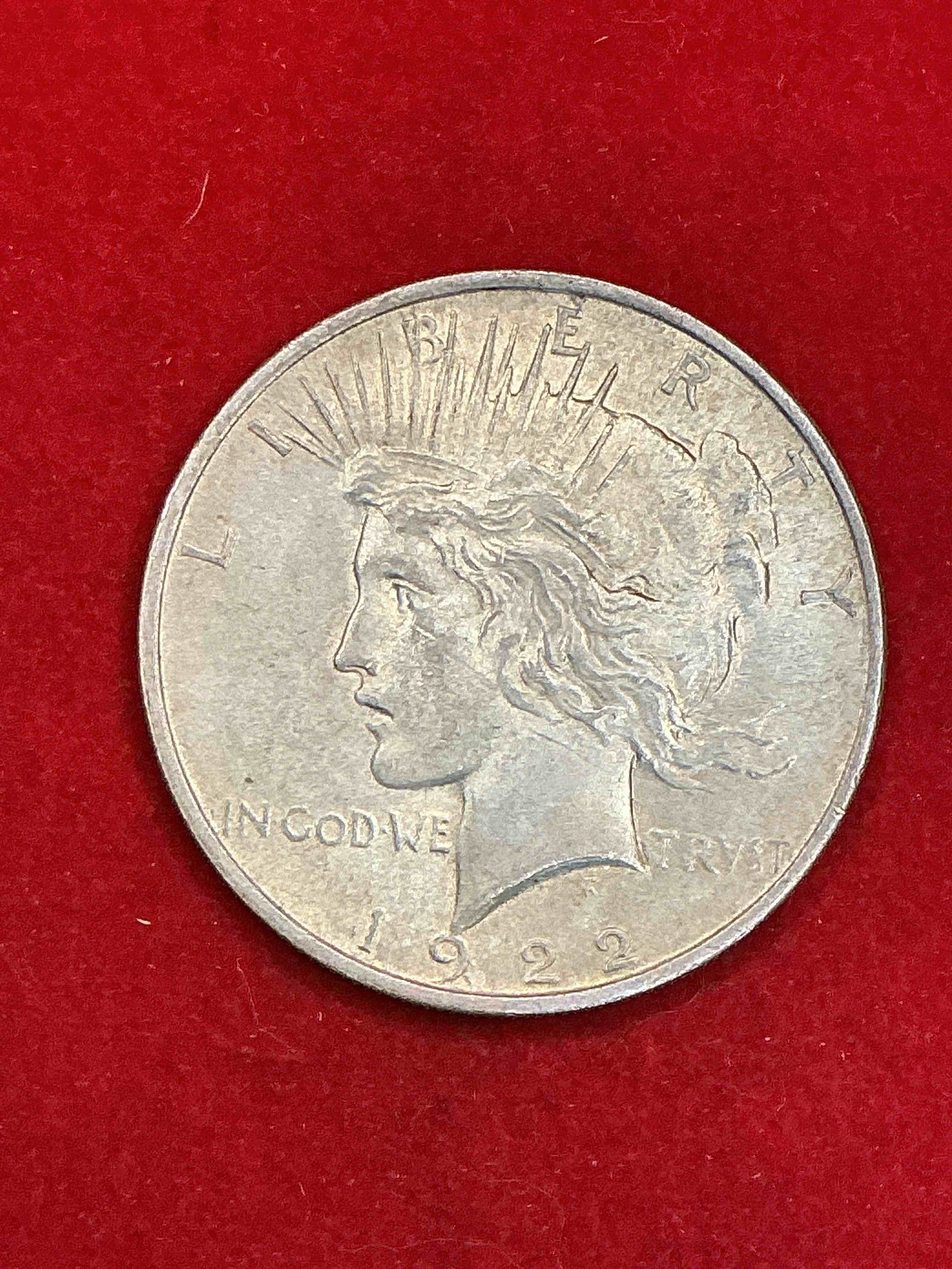 silver peace dollar! one dollar coin from 1922! these one ounce coins are 90% silver & super rare! liberty peace dollars are highly coveted by collectors for their value & beautiful design. add a one ounce liberty peace dollar at 90% silver to your collection! super rare!)