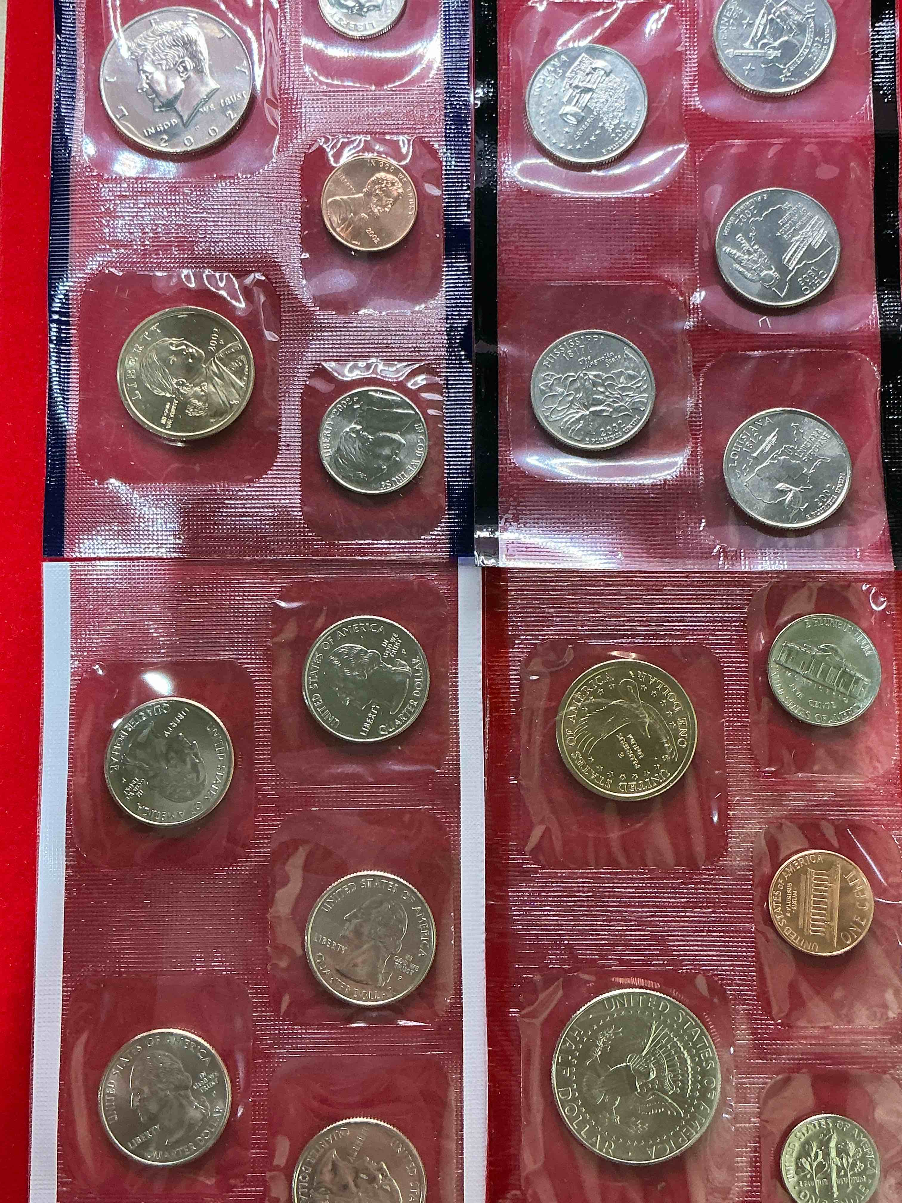 2002 uncirculated mint coins! 20 coins from philadelphia & denver! 20 coin uncirculated lot, with state quarters, nickels, half dollars, dimes, pennies & more! uncirculated coin craziness!