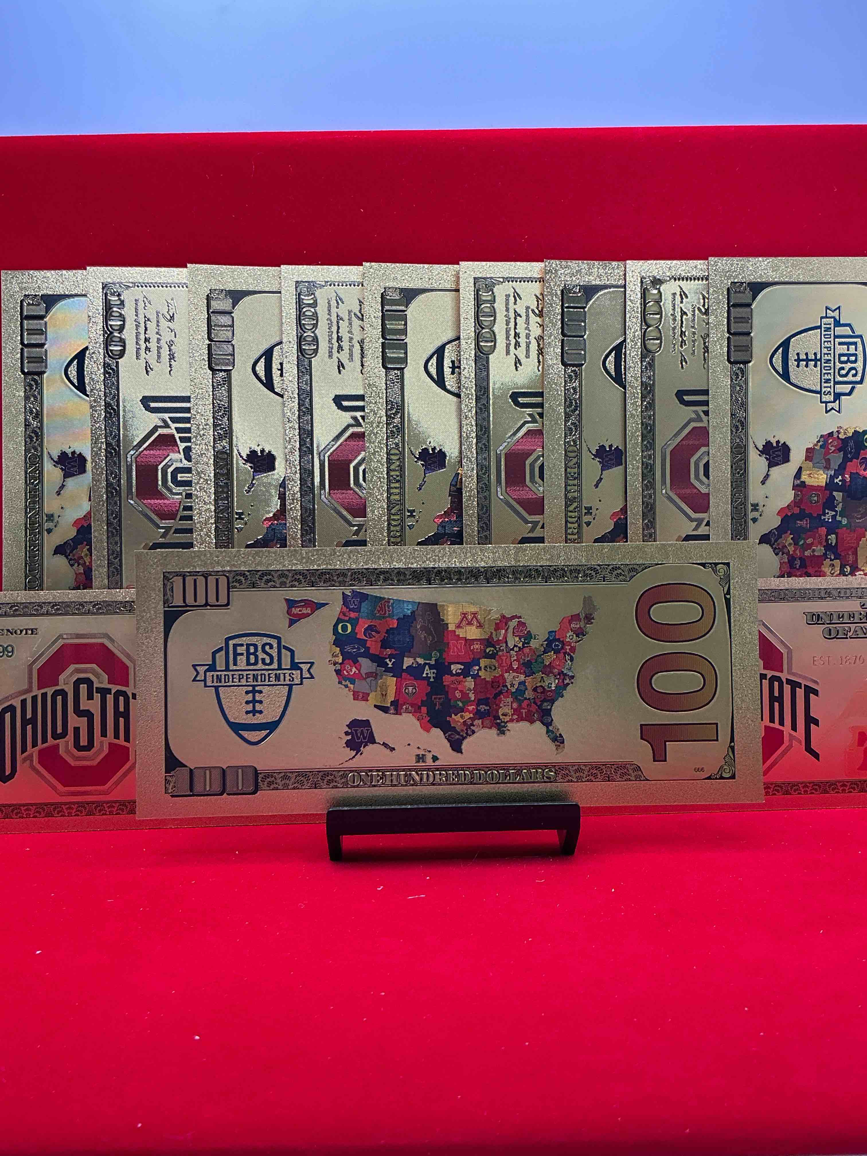 ohio state university collectible memorabilia! super cool, gold in color 100 dollar commemorative ohio state university bill! cool designs on front & back of bill! osu fans rejoice, cool memorabilia! plastic bills with cool designs!