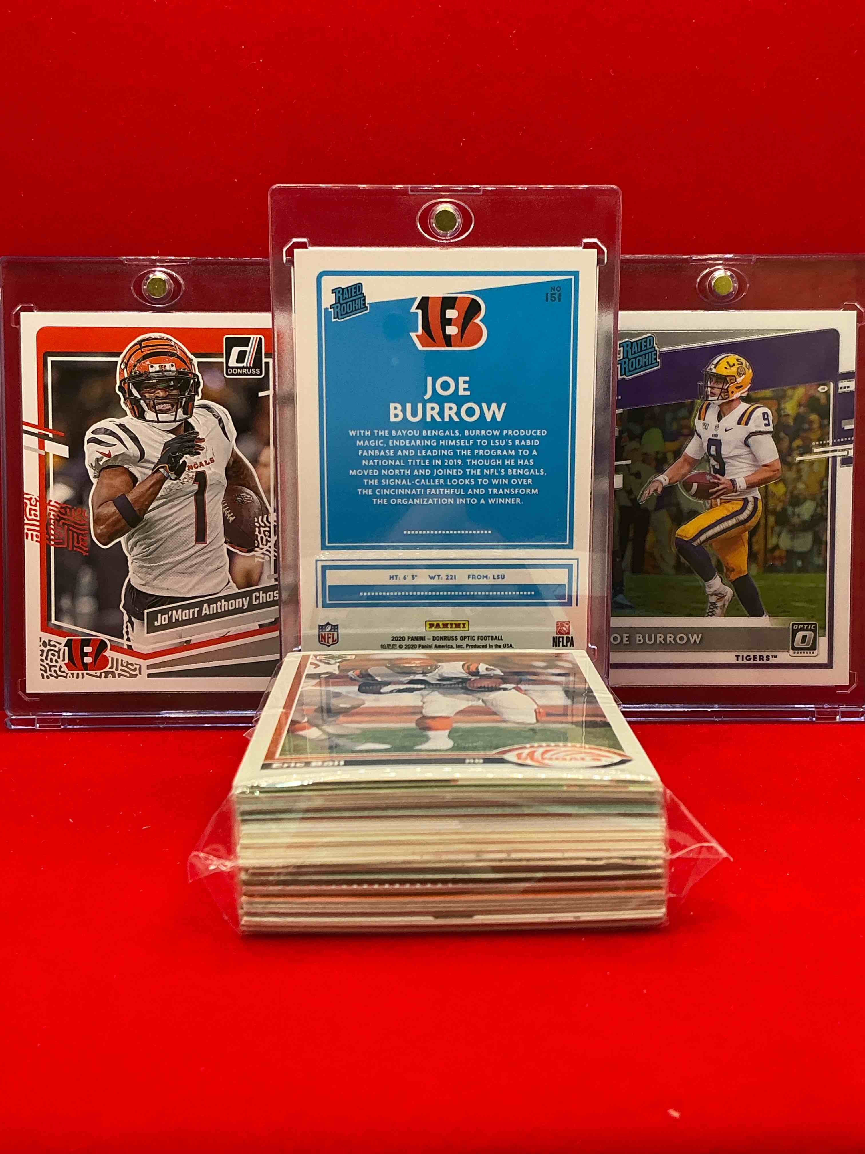 Condition photo showing New/Like New for joe burrow optic rated rookie card! ja’marr chase donruss rare “middle name” edition & more! bengals bonanza! cincy insanity! this 50 card lot includes commons, legends, heroes, rookies & more! vintage & new! wow!