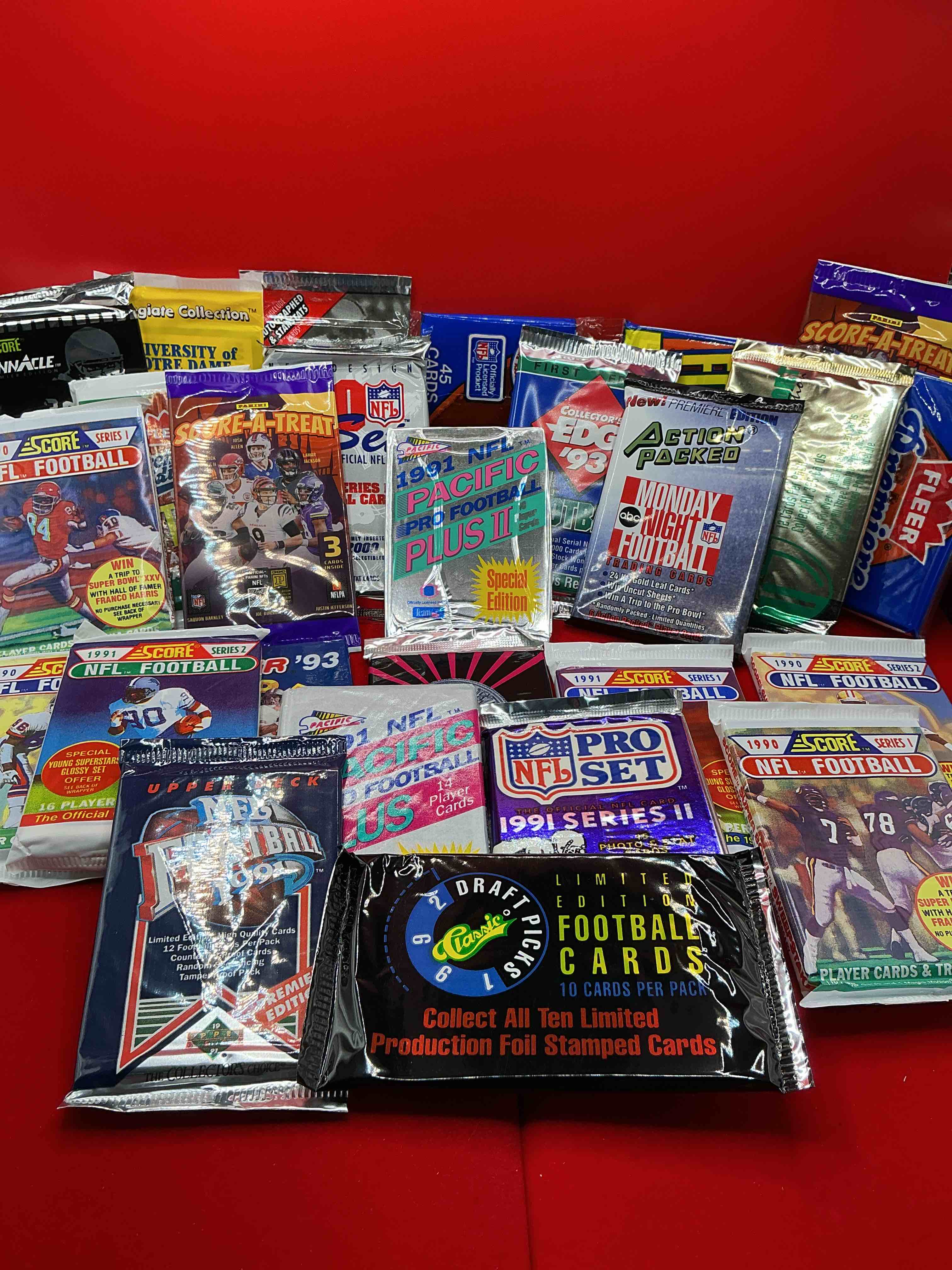 Football Wax WOW!  24 Vintage NFL Football Unopened Wax Packs, All Direct From Original Retail Case!  Search For Stars Throughout The 80’s & 90’s & More!  This 24 Count Lot Truly Has An Incredible Variety Of Football Packs From Many Years Featuring Some Of The Greatest Players Of All Time!  Some Very Rare!  Almost Impossible To Collect!  A Great Opportunity For Collectors & Re-Sellers!