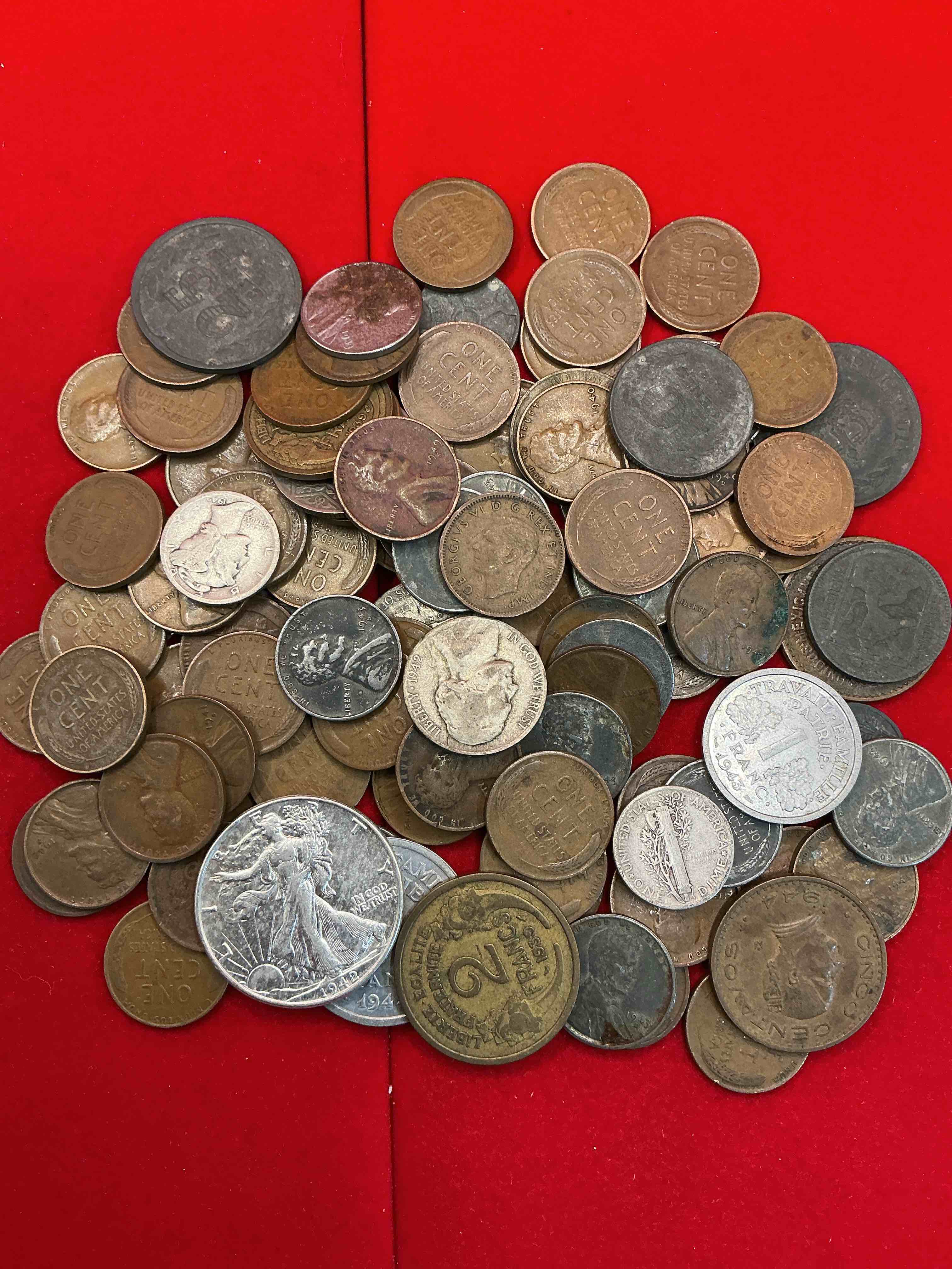 World War Wow!  100 Coin Lot!  Includes Silver!  Here It Is, An Impossibly Hard To Collect Collection!  100 Coins Spanning The Years Of World War One (1914-1918) And World War Two (1939-1945).  Coins From U.S. & Worldwide Also!  1943 Steel Pennies Included, Silver Nickels Included, Silver Half Dollar & Mercury Dimes, 1944 D-Day Era Coins Included & So Much More!  Many Early 1900’s World War One Coins That Are Impossibly Hard To Find!  World War Buffs Rejoice!  Find This Nowhere Else!!! 