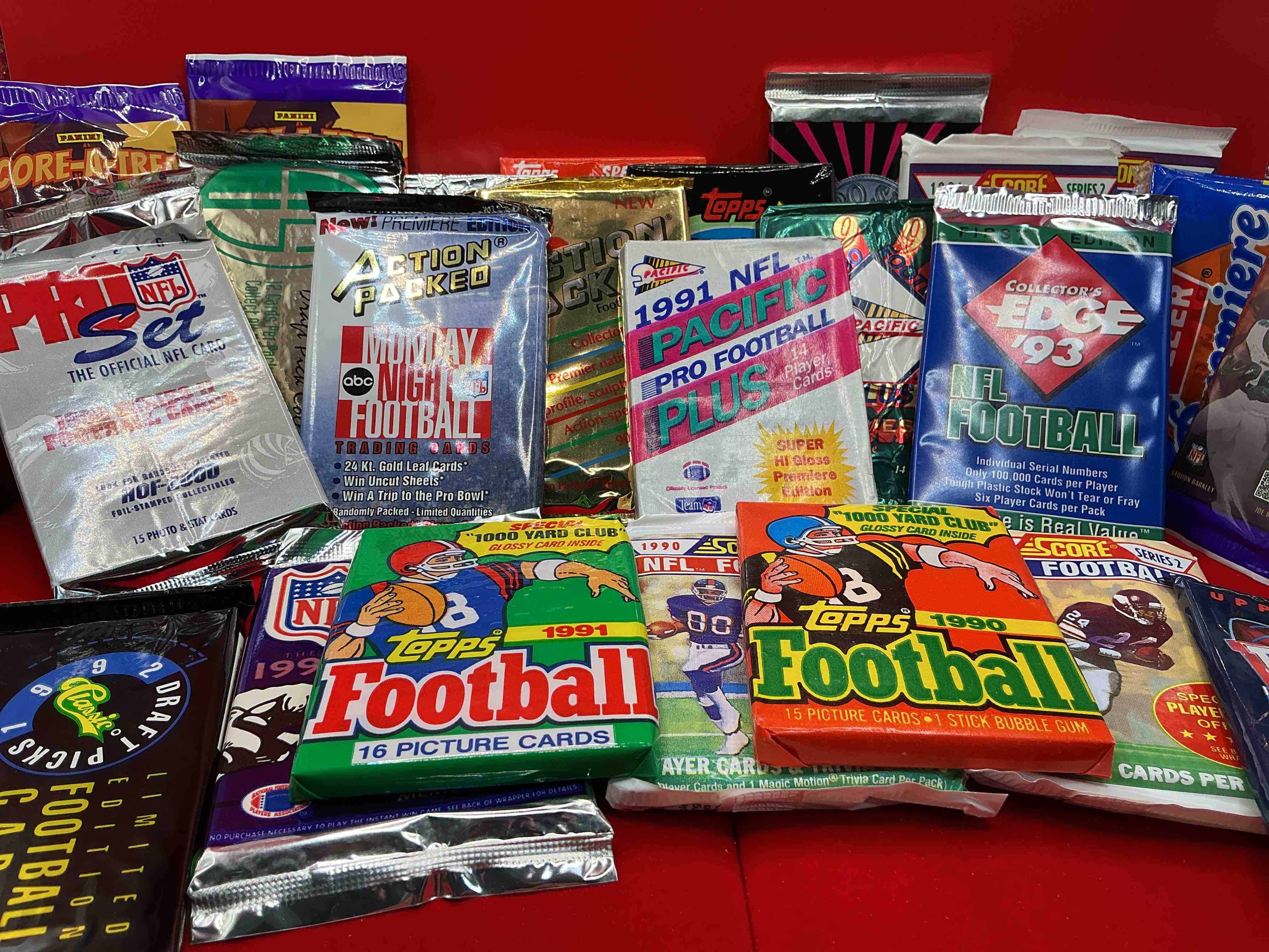 Football Wax WOW!  24 Vintage NFL Football Unopened Wax Packs, All Direct From Original Retail Case!  Search For Stars Throughout The 80’s & 90’s & More!  This 24 Count Lot Truly Has An Incredible Variety Of Football Packs From Many Years Featuring Some Of The Greatest Players Of All Time!  Some Very Rare!  Almost Impossible To Collect!  A Great Opportunity For Collectors & Re-Sellers!