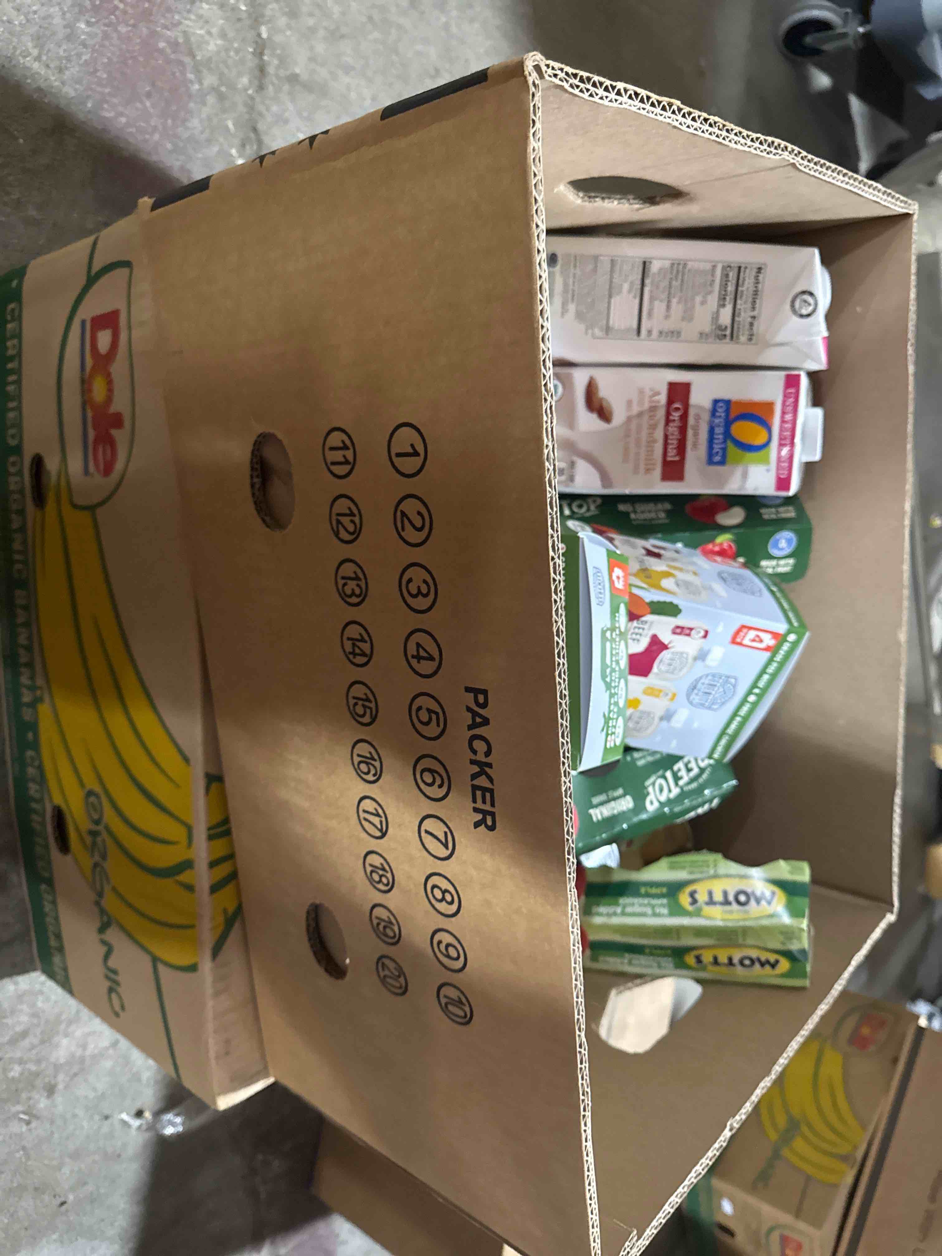 Condition photo showing Good Condition for box of assorted grocery products bb 2.2026