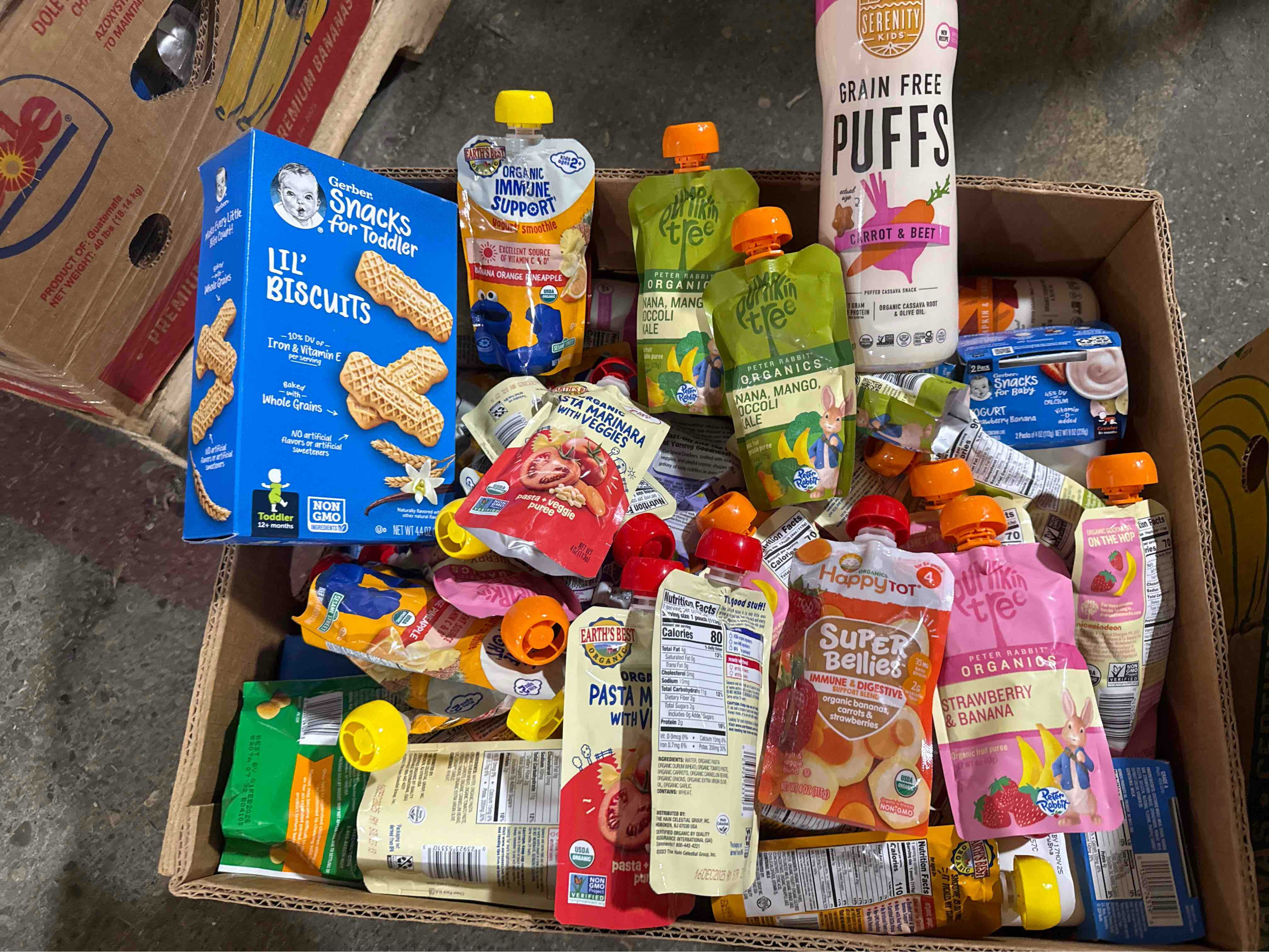 box of assorted grocery products/ baby snacks  bb1.2026 