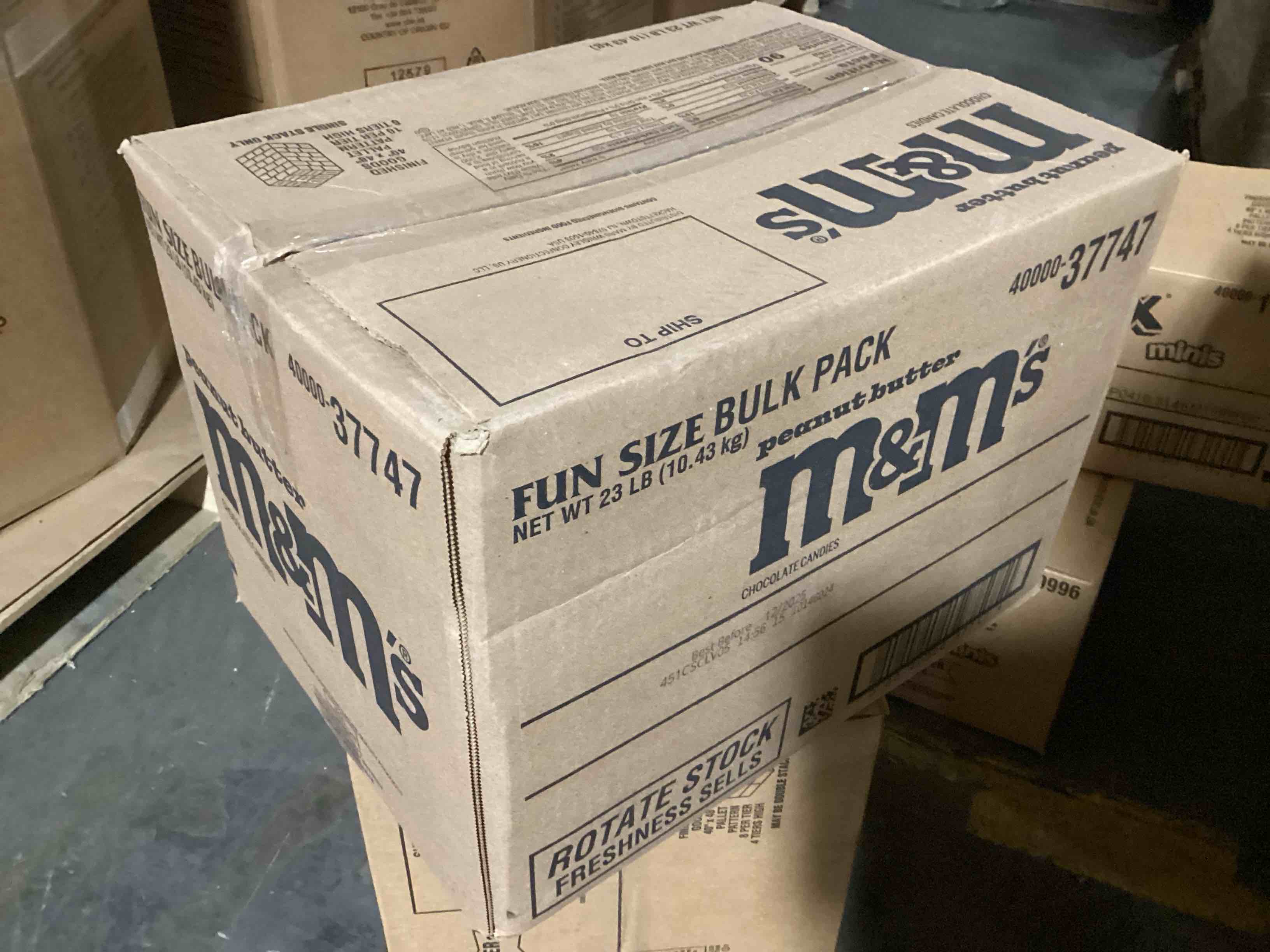 Condition photo showing New/Like New for 23 pound bulk fun size m&ms peanut butter milk chocolate candy (bb 12/25)