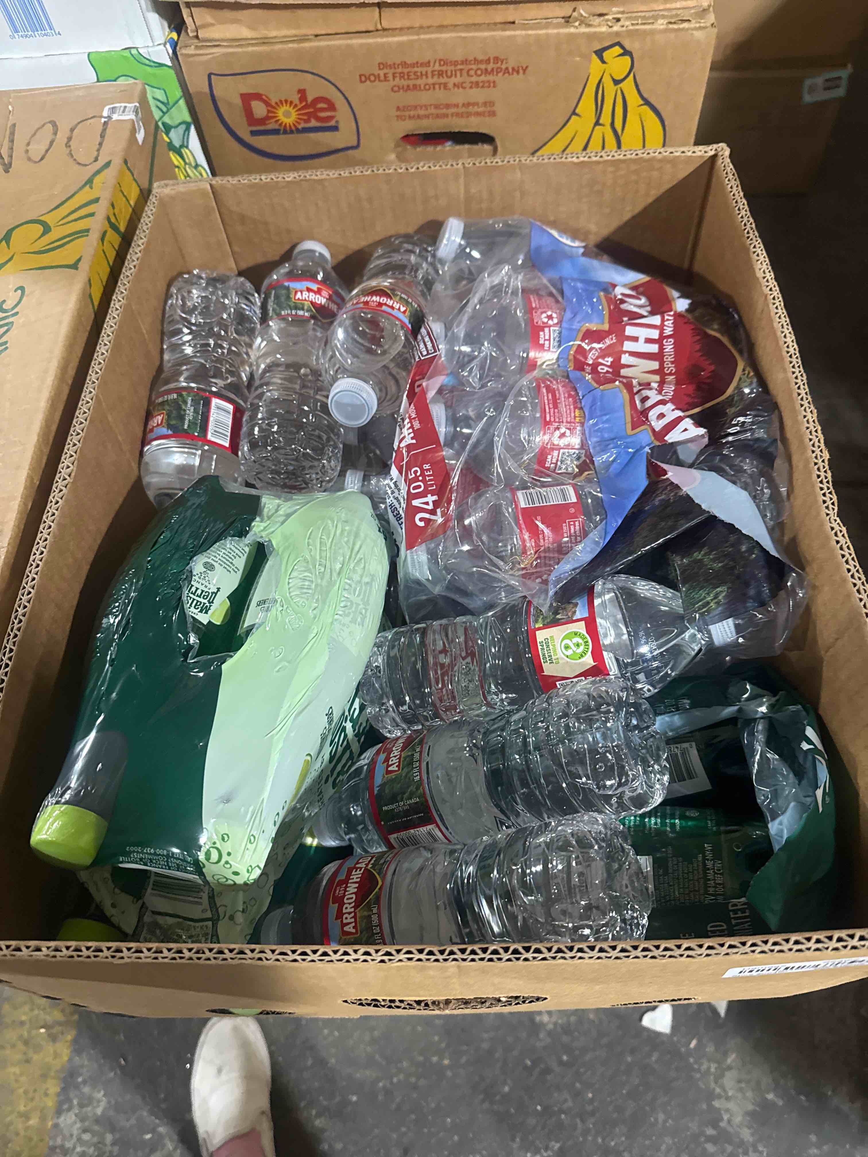 Condition photo showing Brand New for box of water