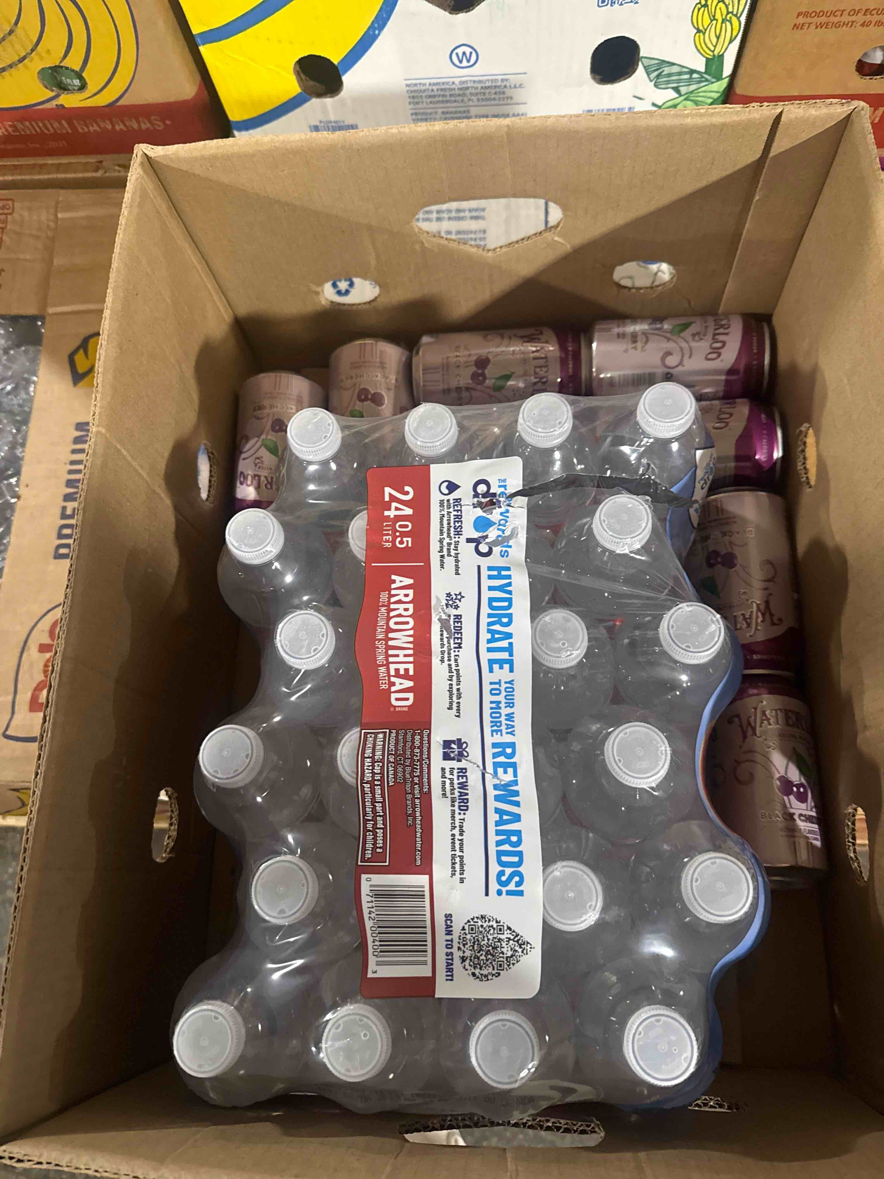 Condition photo showing Brand New for box of water