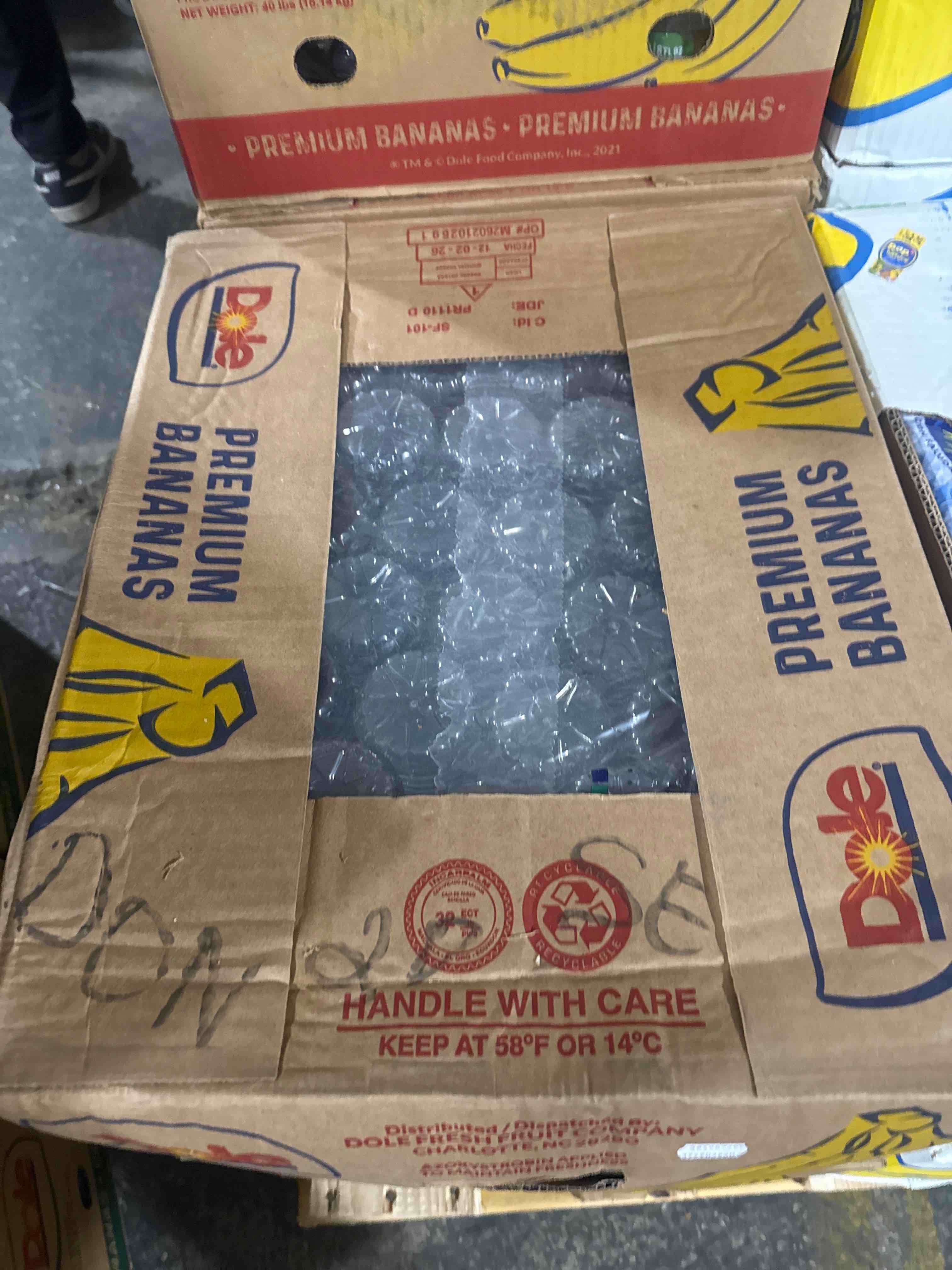 Condition photo showing Brand New for box of water