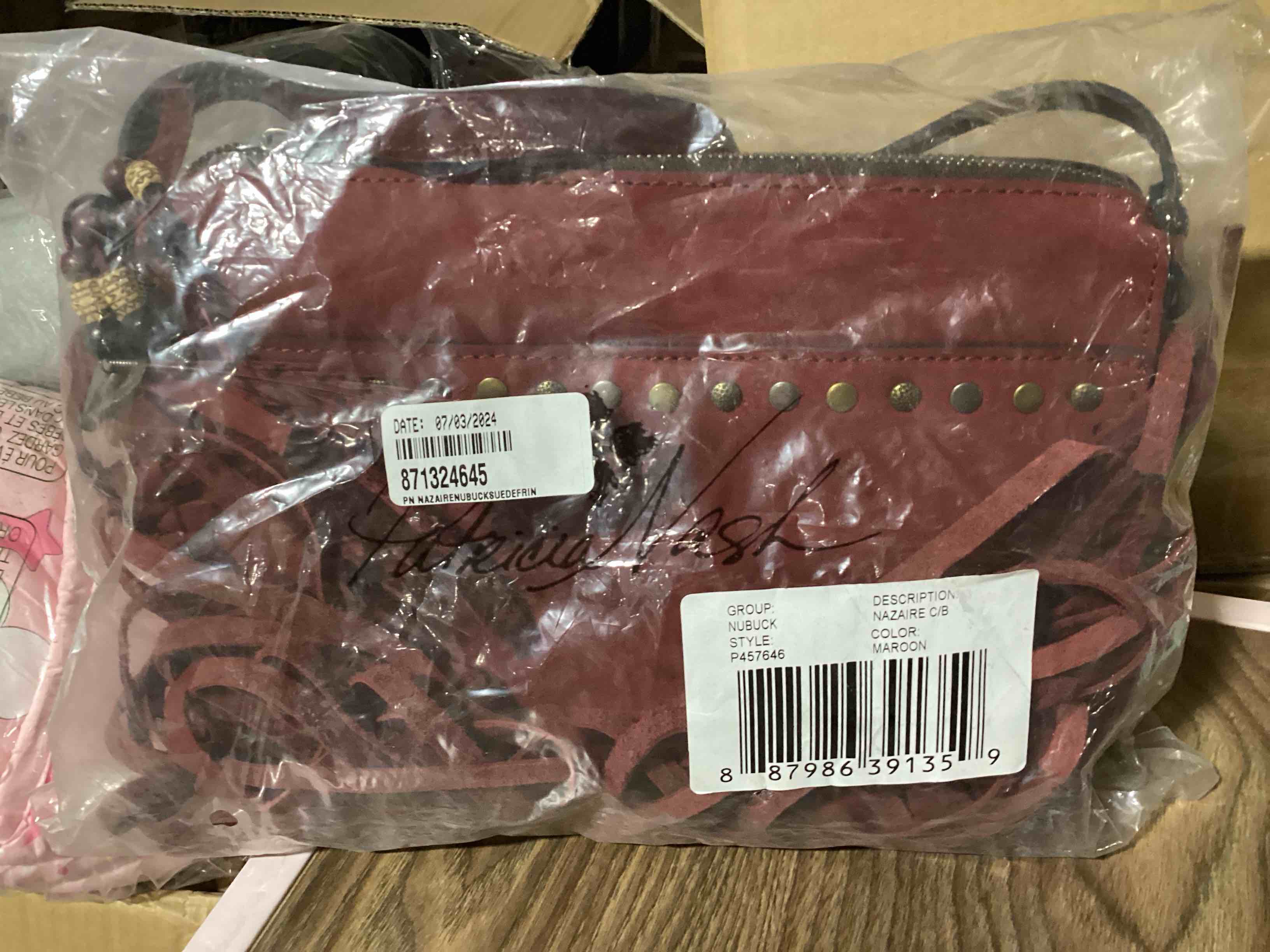 Condition photo showing New/Like New for patricia nash nubuck suede nazaire crossbody with fringe - maroon