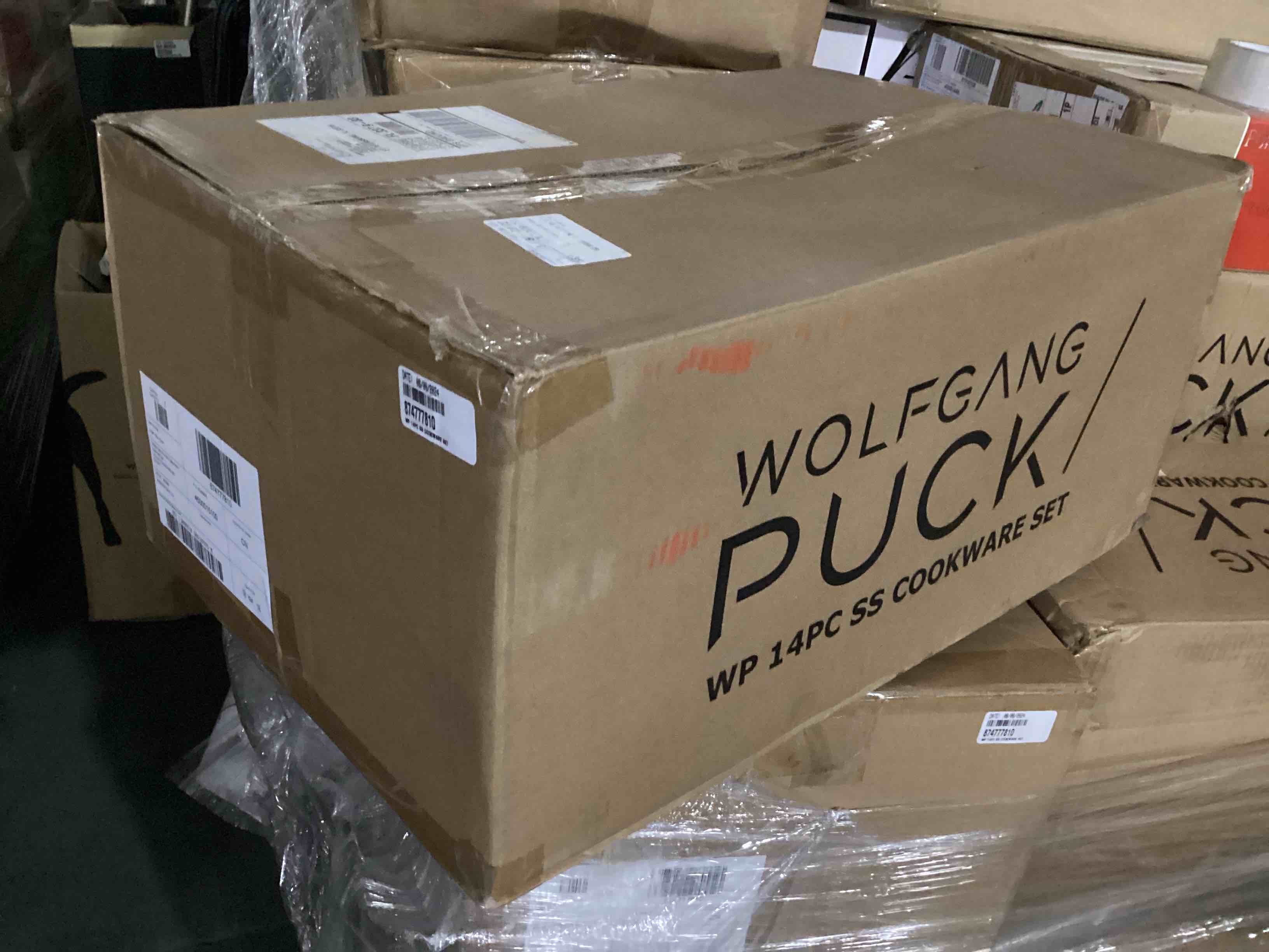 Condition photo showing New/Like New for wolfgang puck 14-piece stainless steel cookware set - copper