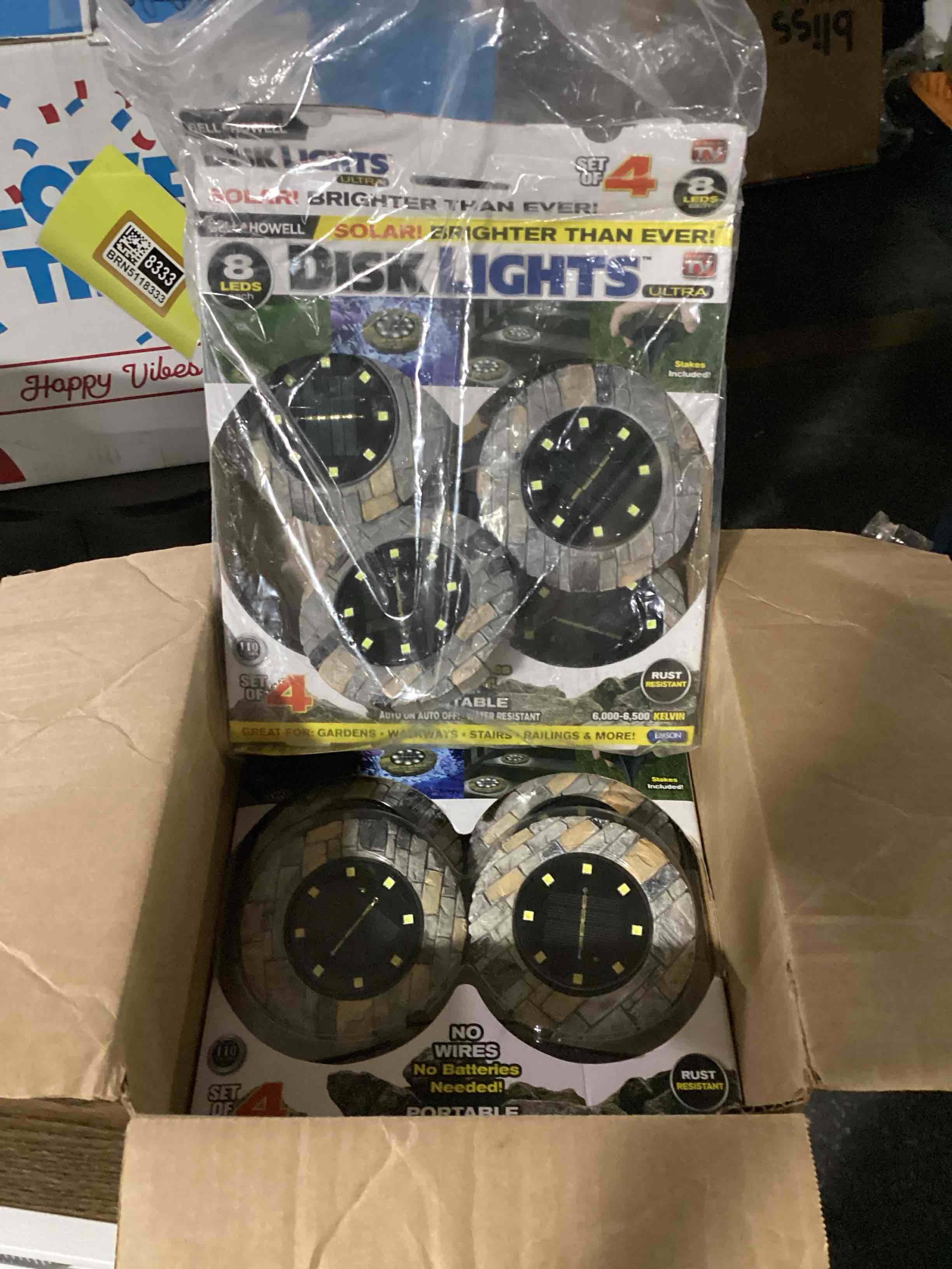 Condition photo showing New/Like New for pack of 8 bell + howell disk lights