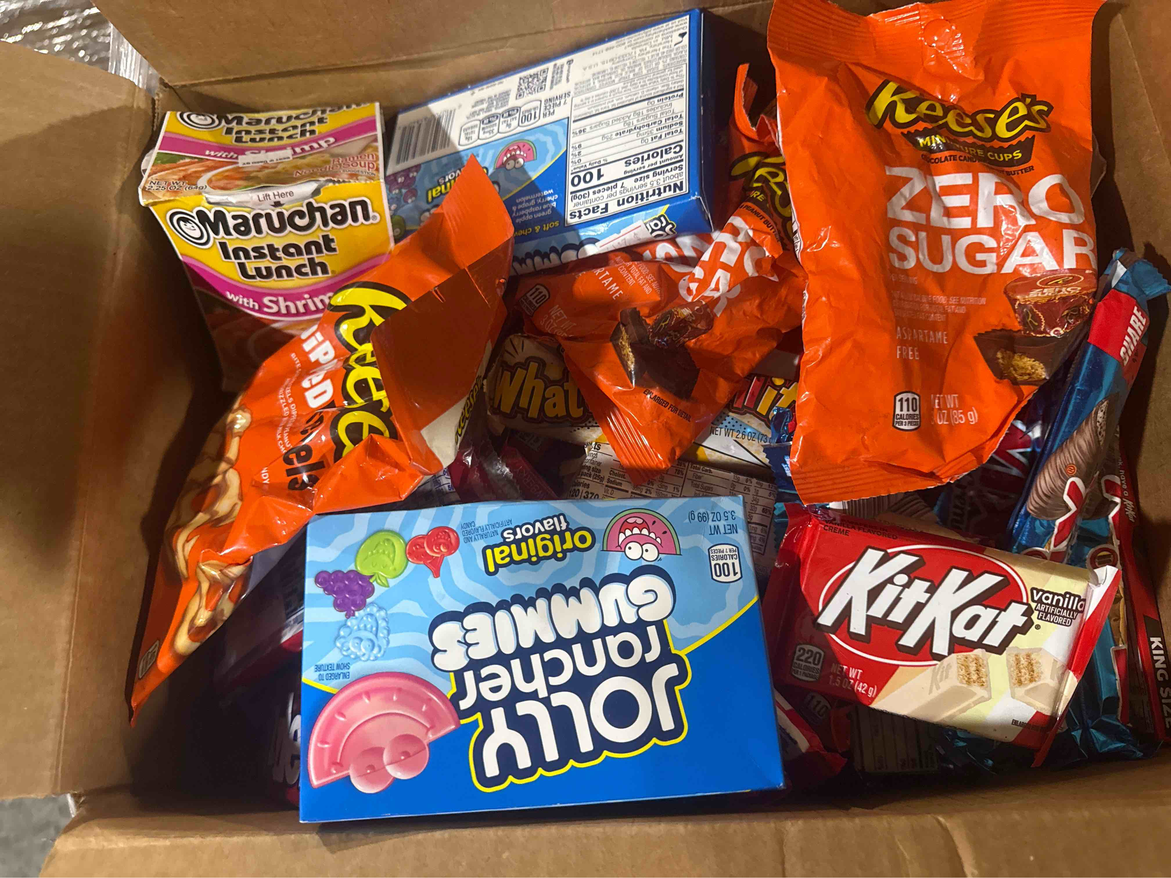 box of assorted candy and foods