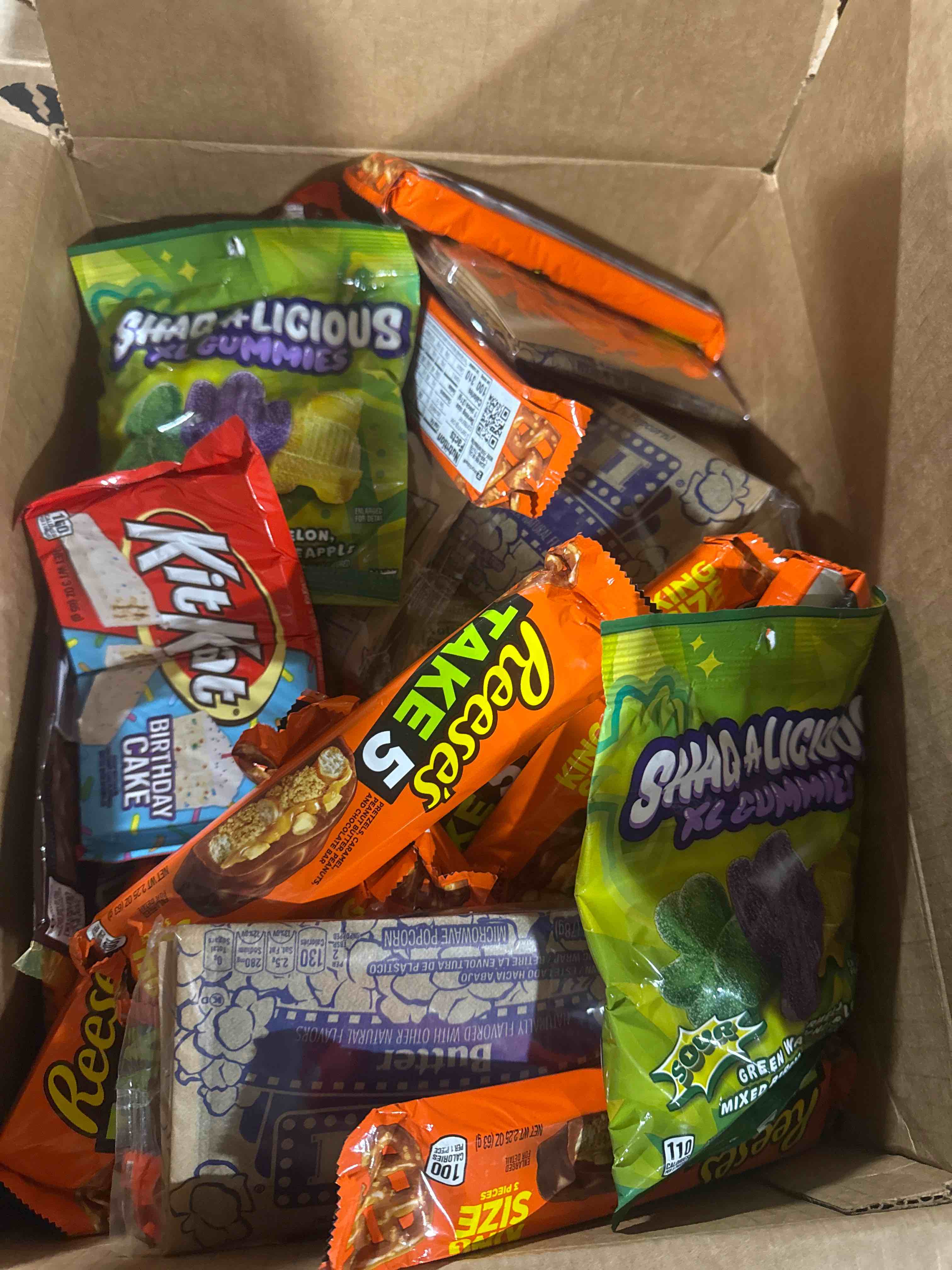 box of assorted candy and foods