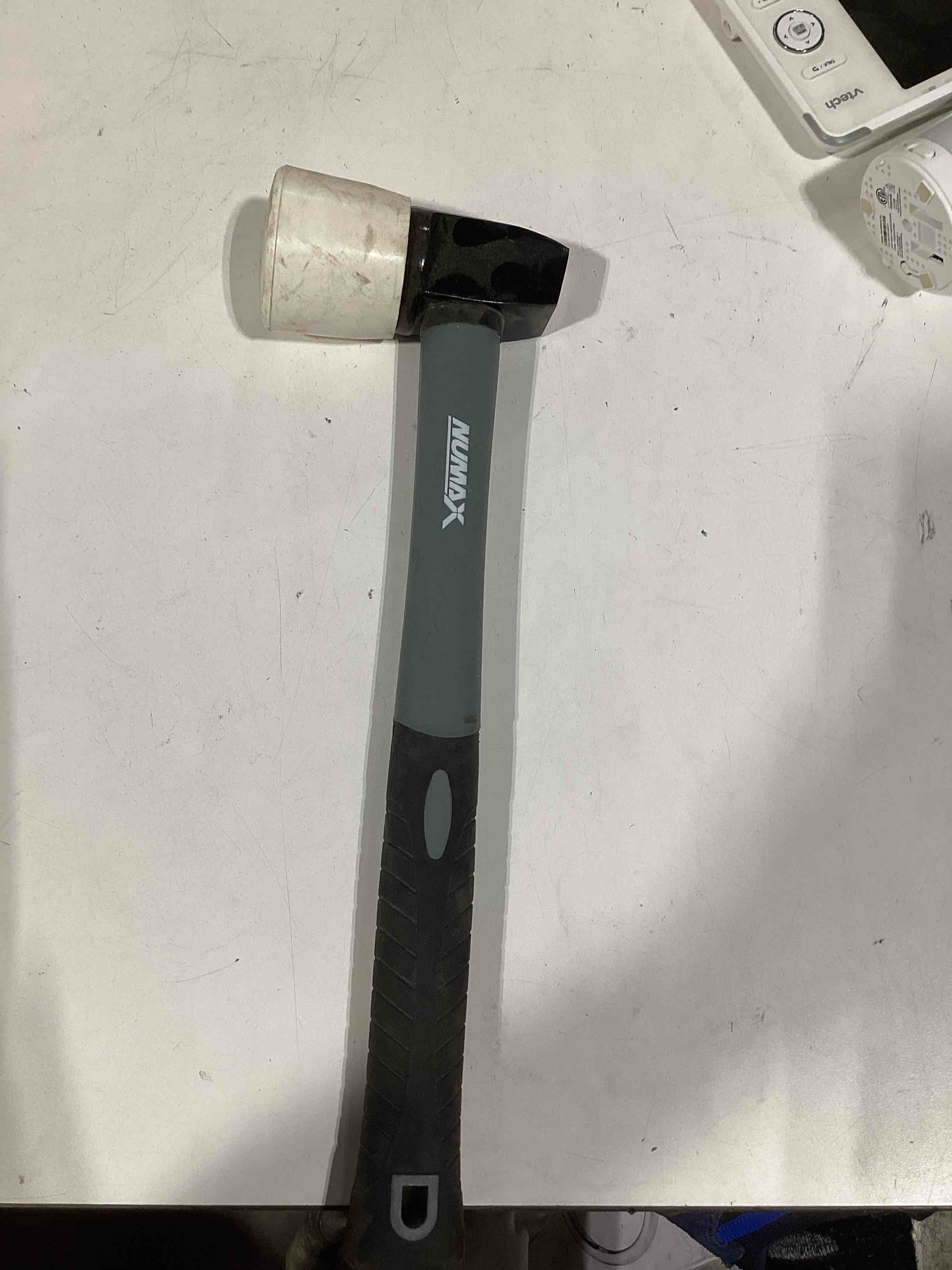 Condition photo showing As Is for numax rubber flooring mallet