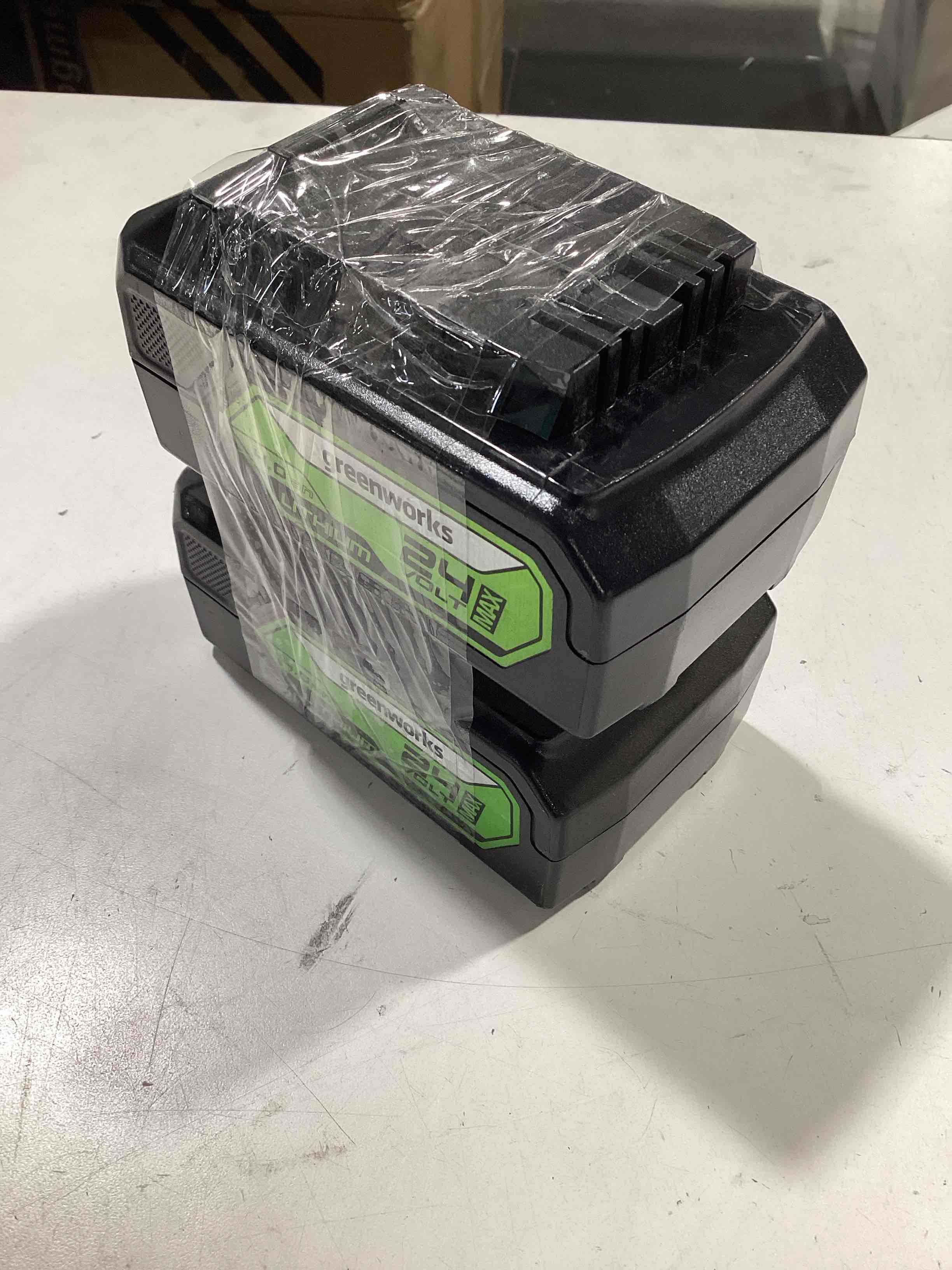 Condition photo showing As Is for greenworks 24v 4.0ah lithium-ion battery (genuine greenworks battery/ 125+ compatible tools)