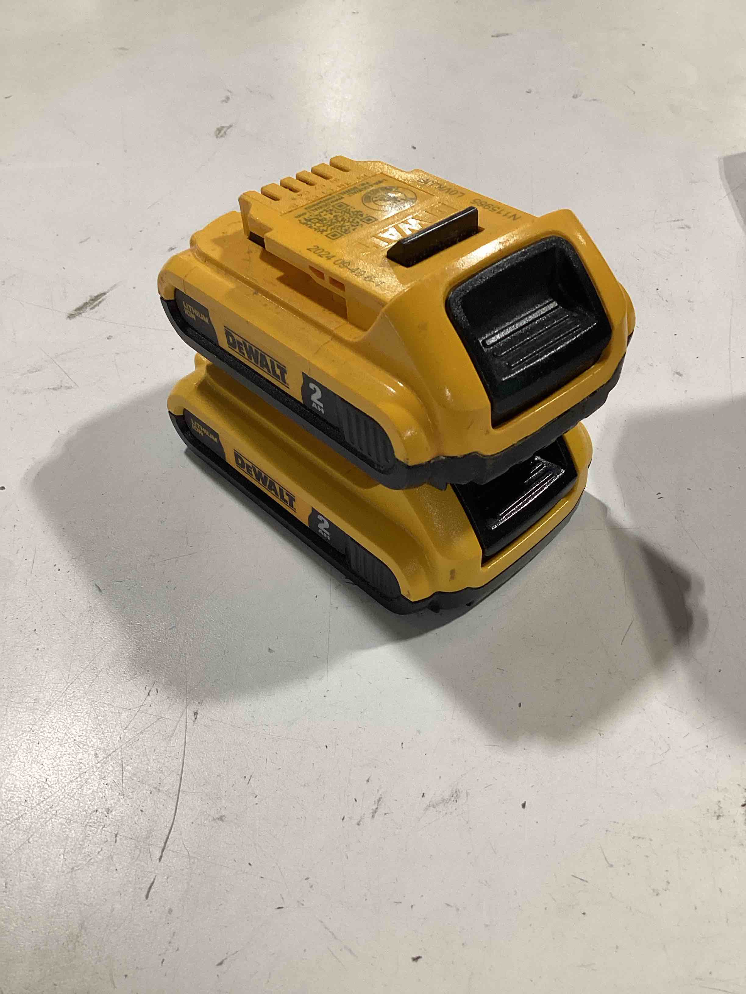 Condition photo showing As Is for dewalt 20v max battery, compact 2.0ah double pack (dcb203-2)