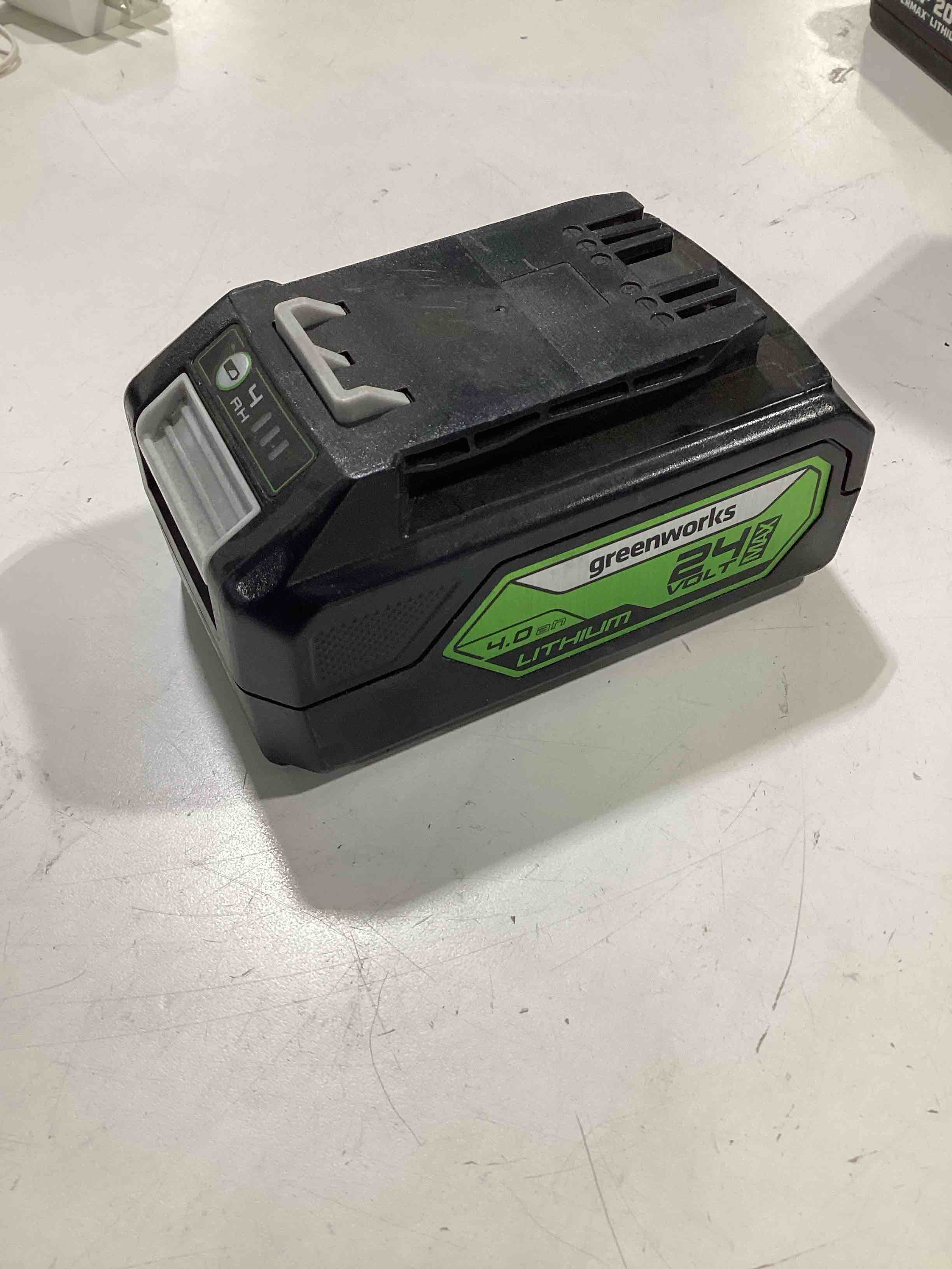 Condition photo showing As Is for untested. greenworks 24v 4.0ah lithium-ion battery (genuine greenworks battery/ 125+ compatible tools)