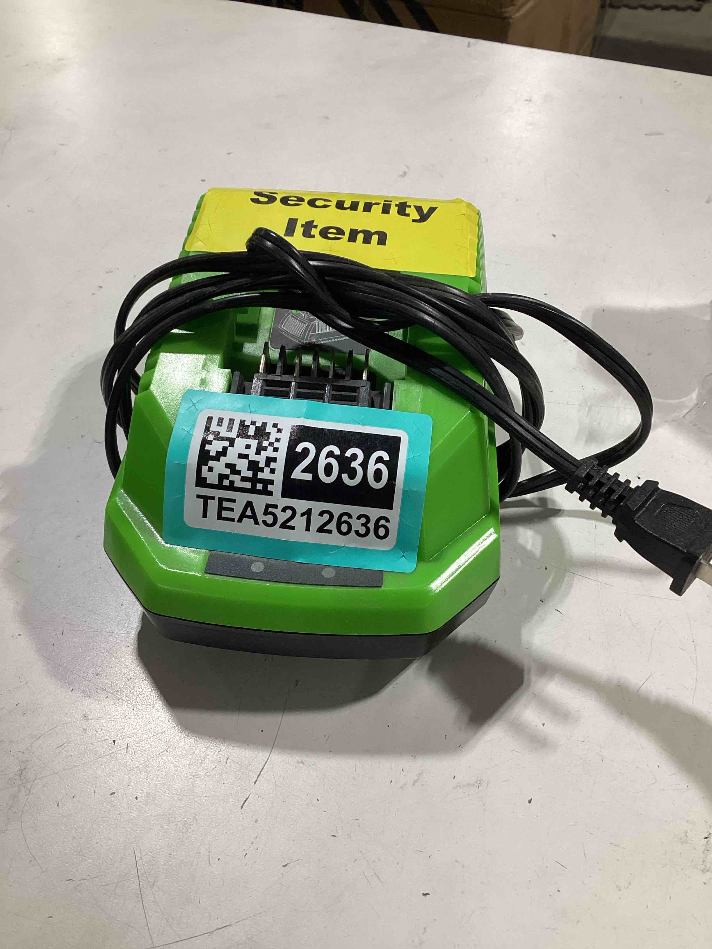 Condition photo showing As Is for untested. greenworks 40v lithium-ion battery charger (genuine greenworks charger)