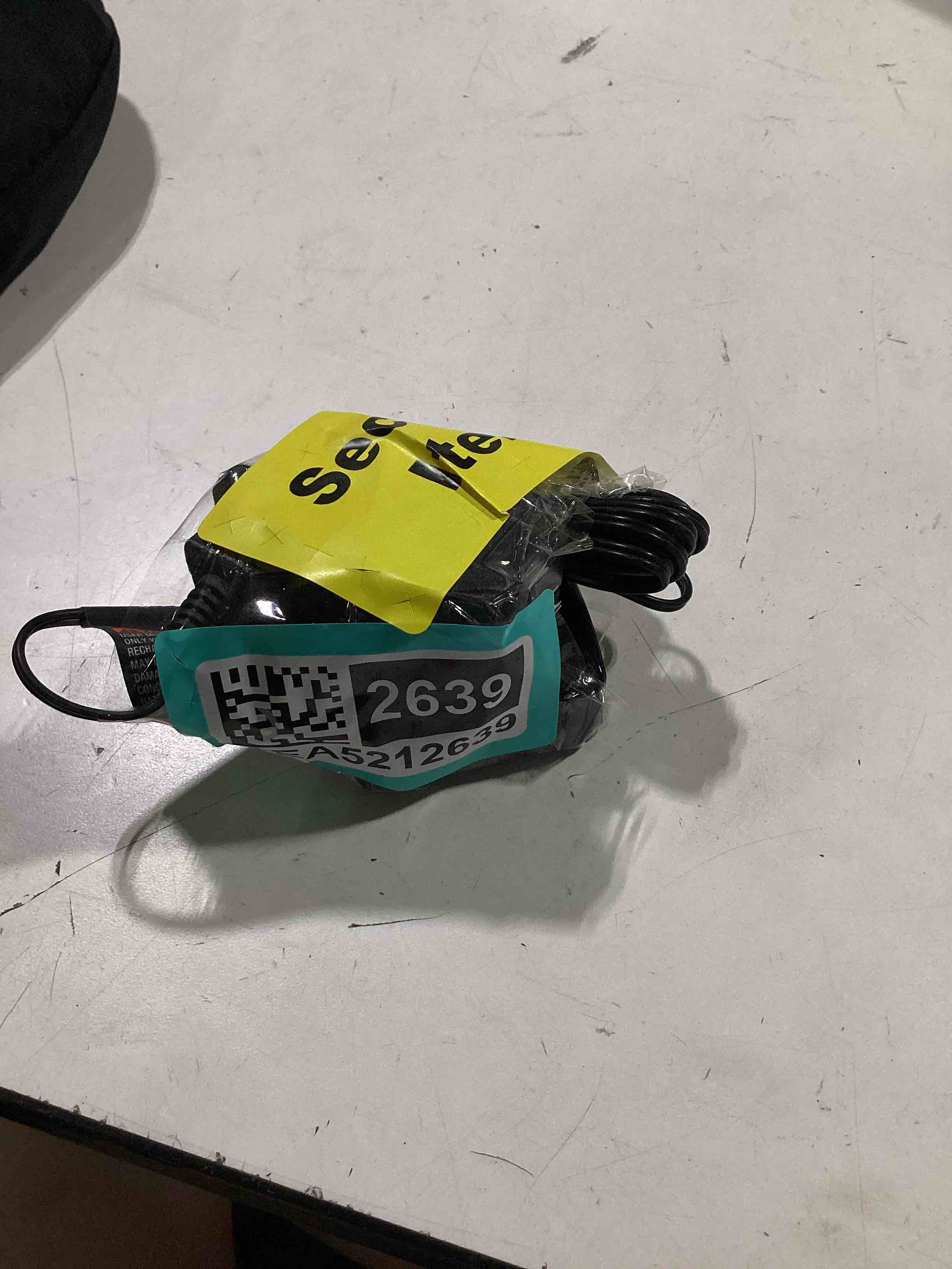 Condition photo showing As Is for untested. black+decker 20v max lithium battery charger, compatible with 12v and 20v battery, battery sold separately (lcs1620b)