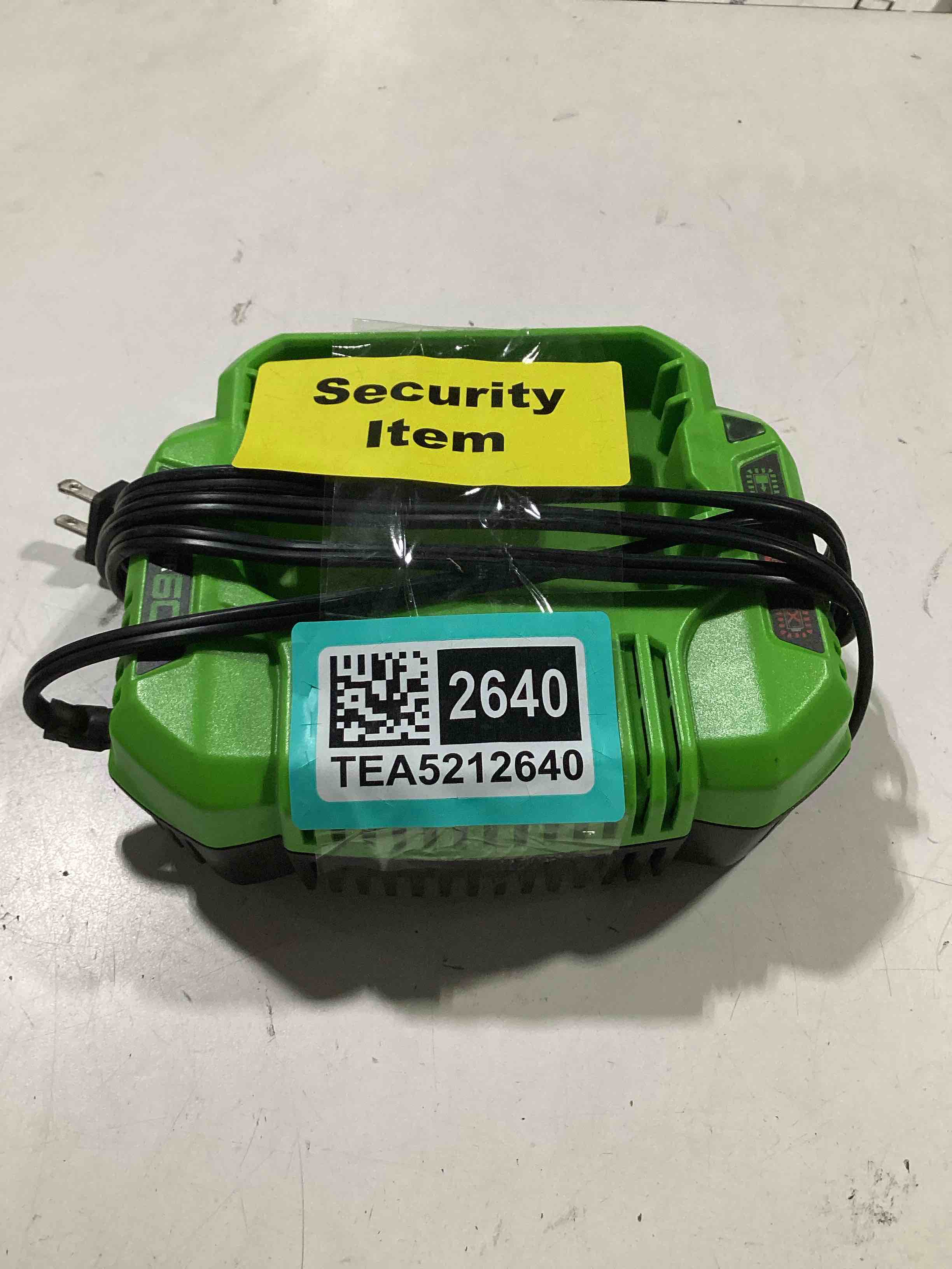 Condition photo showing As Is for untested. greenworks pro 60v 3a standard charger