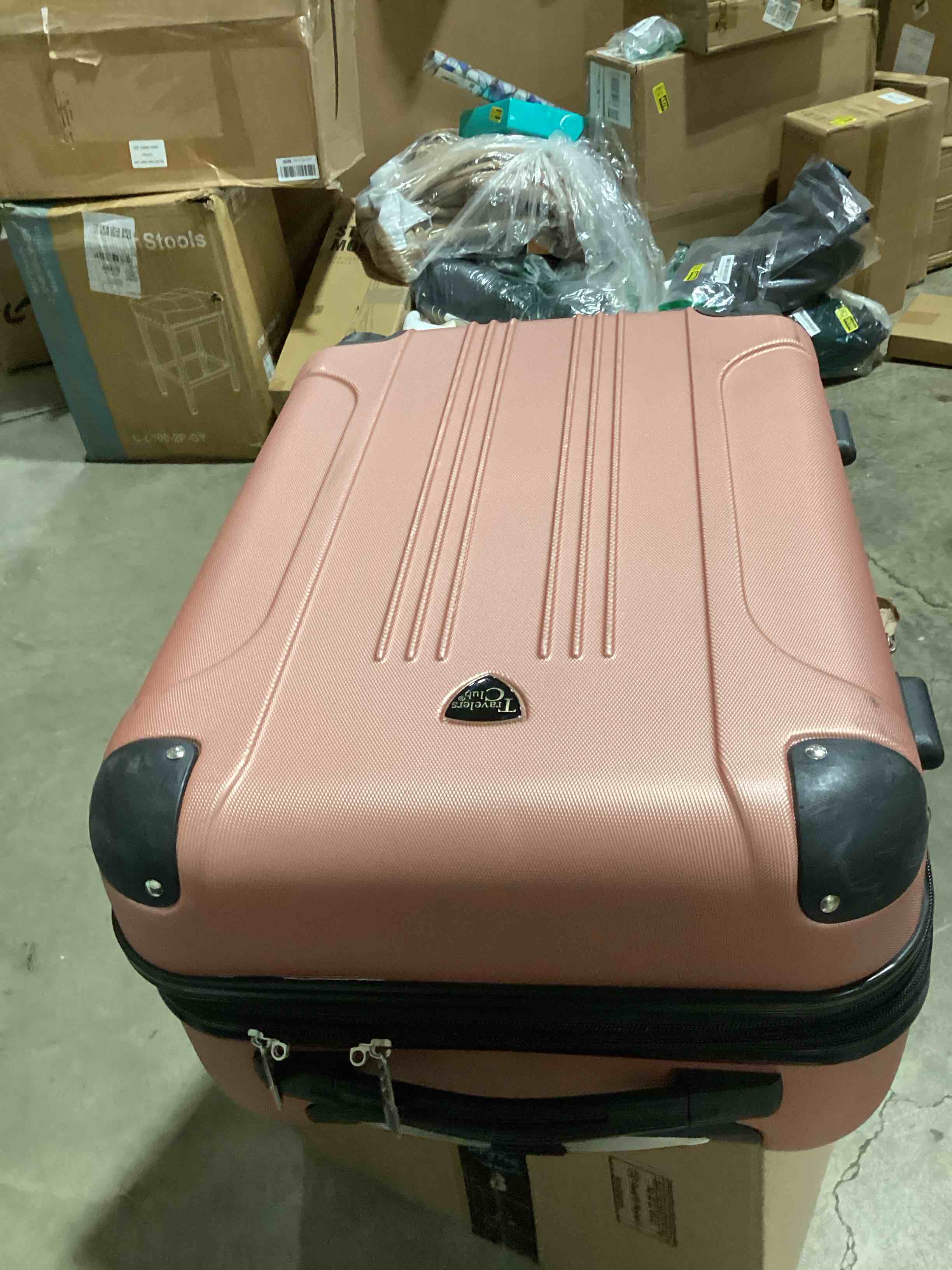 Condition photo showing As Is for one wheel broke travelers club chicago hardside expandable spinner luggages, rose gold, 20" carry-on