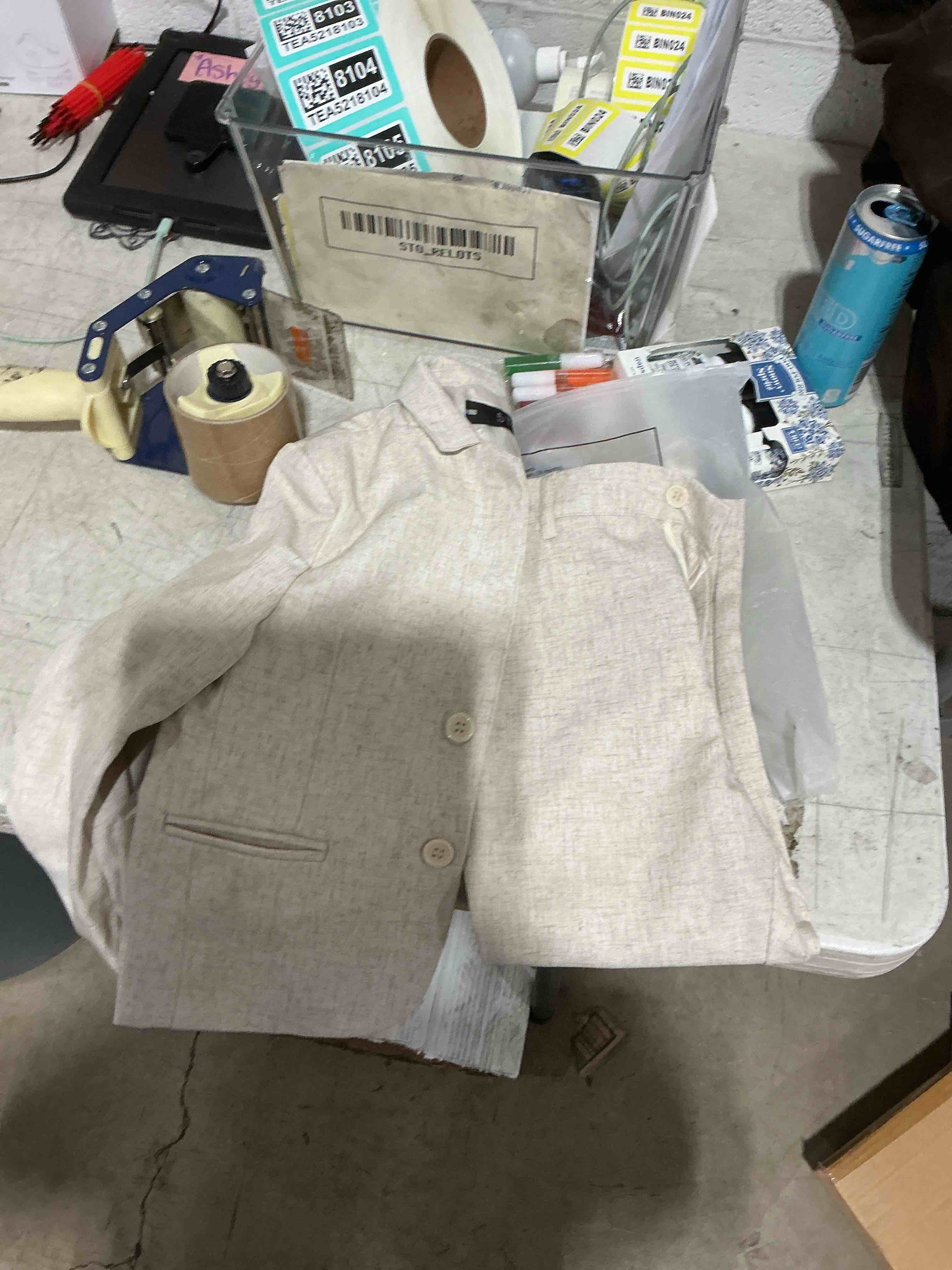 Condition photo showing Good Condition for woman’s suit jacket and pants 