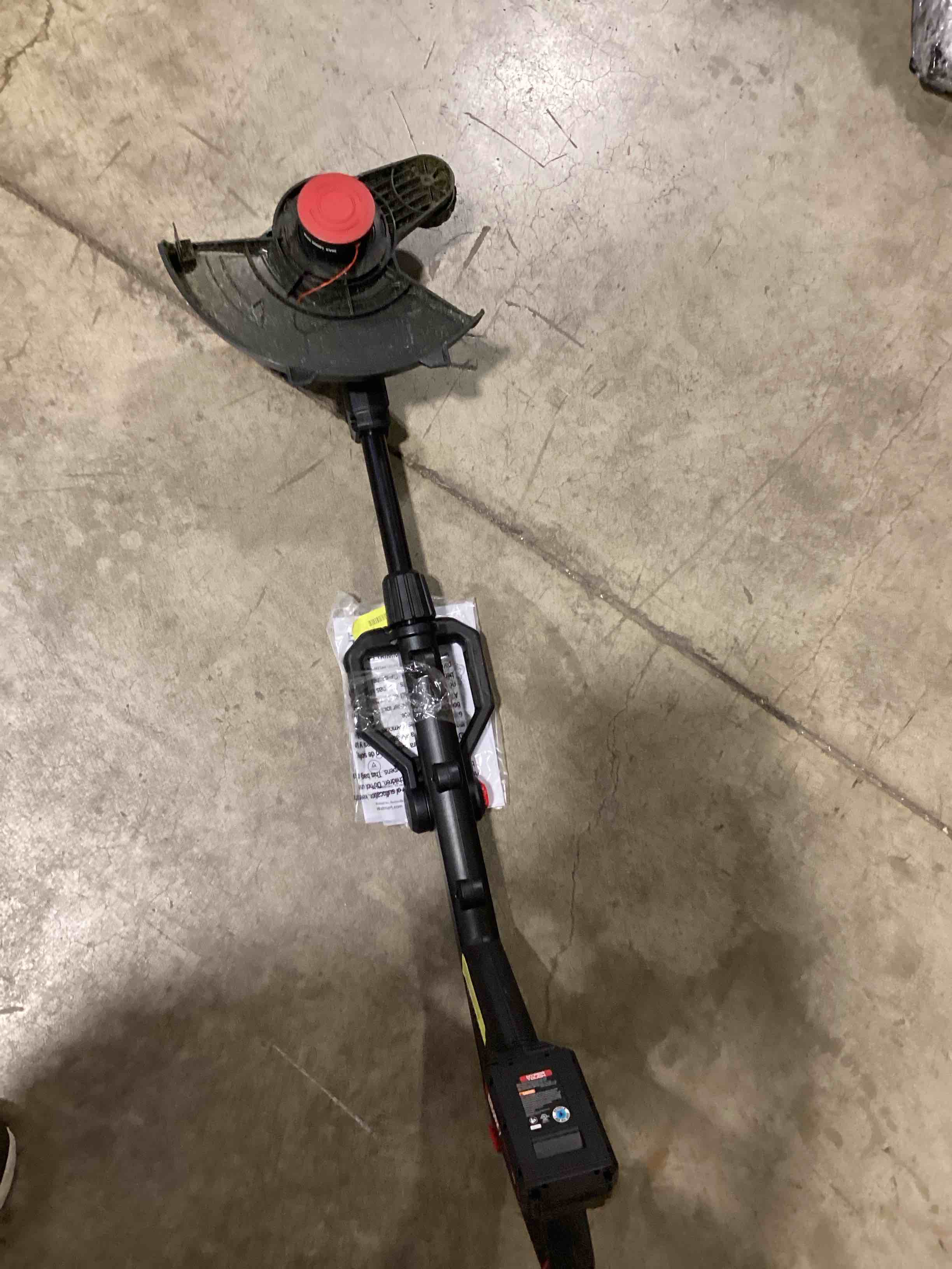 Condition photo showing As Is for open box hyper tough 12" 20v brushless cordless string trimmer with 20v max 2.0ah battery and charging cable