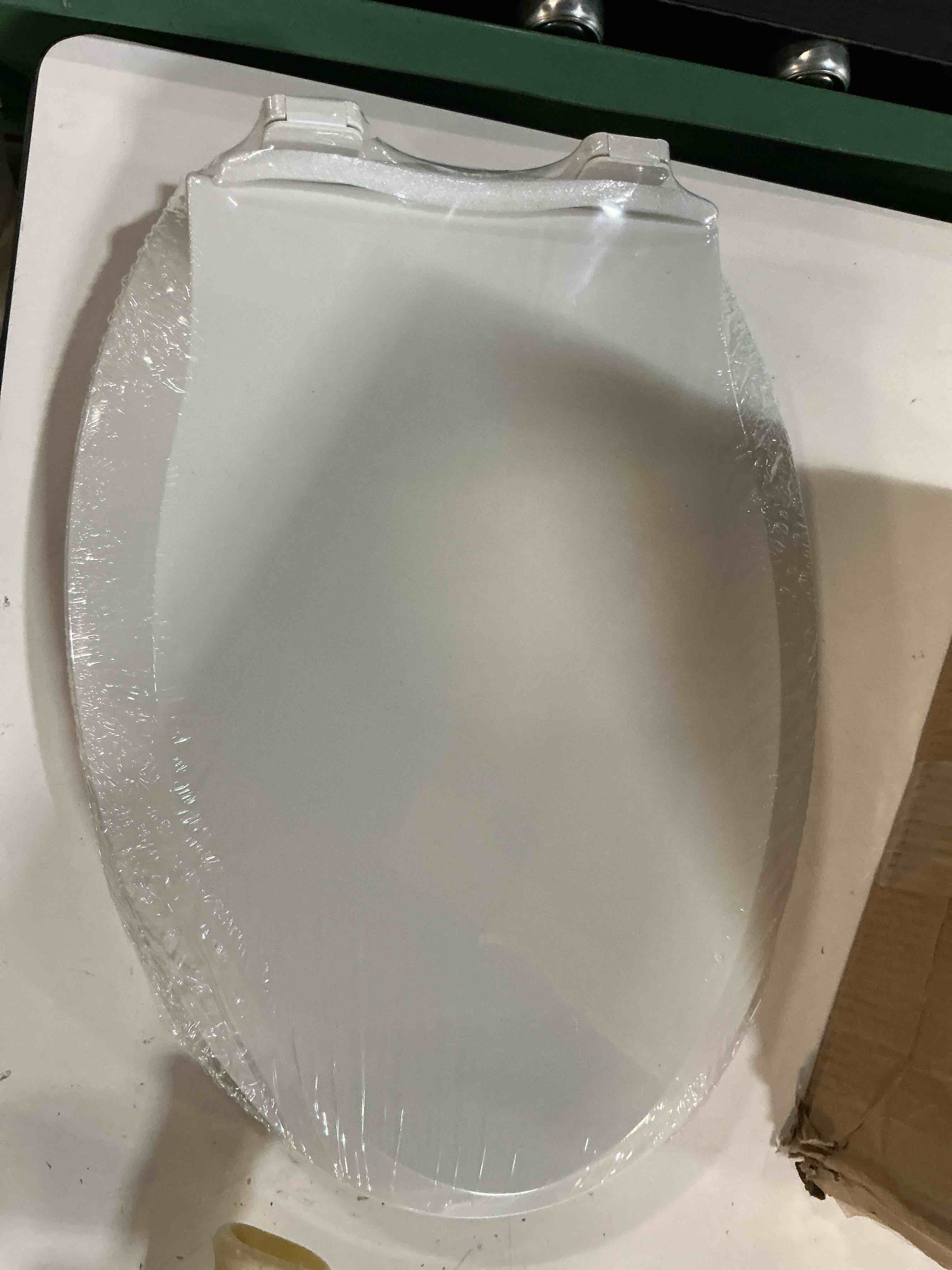Condition photo showing New/Like New for toilet seat, round toilet seat with toddler seat built in, potty training toilet seat round fits both adult and child, with slow close and magnets- round white round with toddler seat
