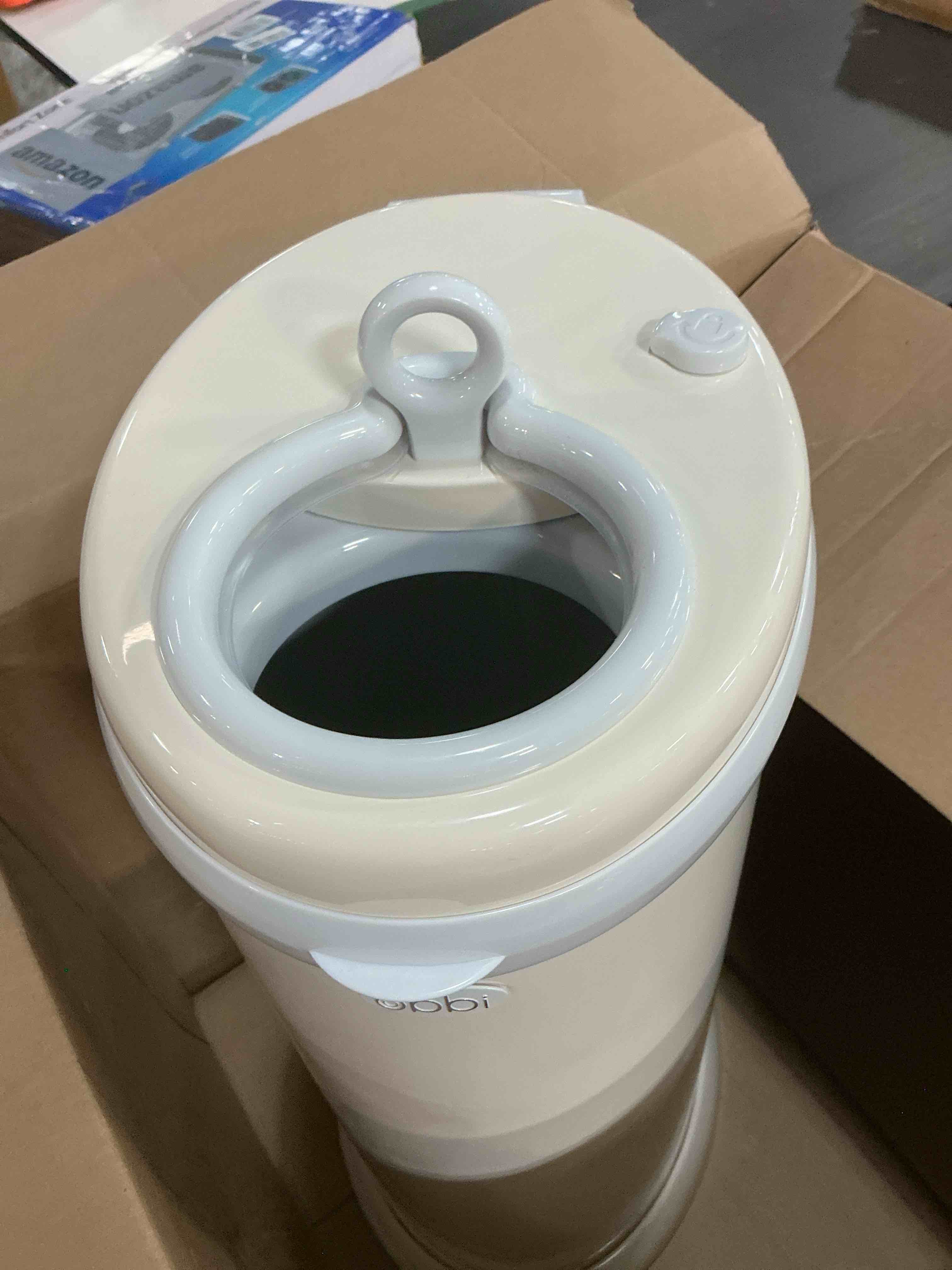 Condition photo showing As Is for ubbi stainless steel diaper pail, odor locking, no special bag required, award-winning, registry must-have, taupe
