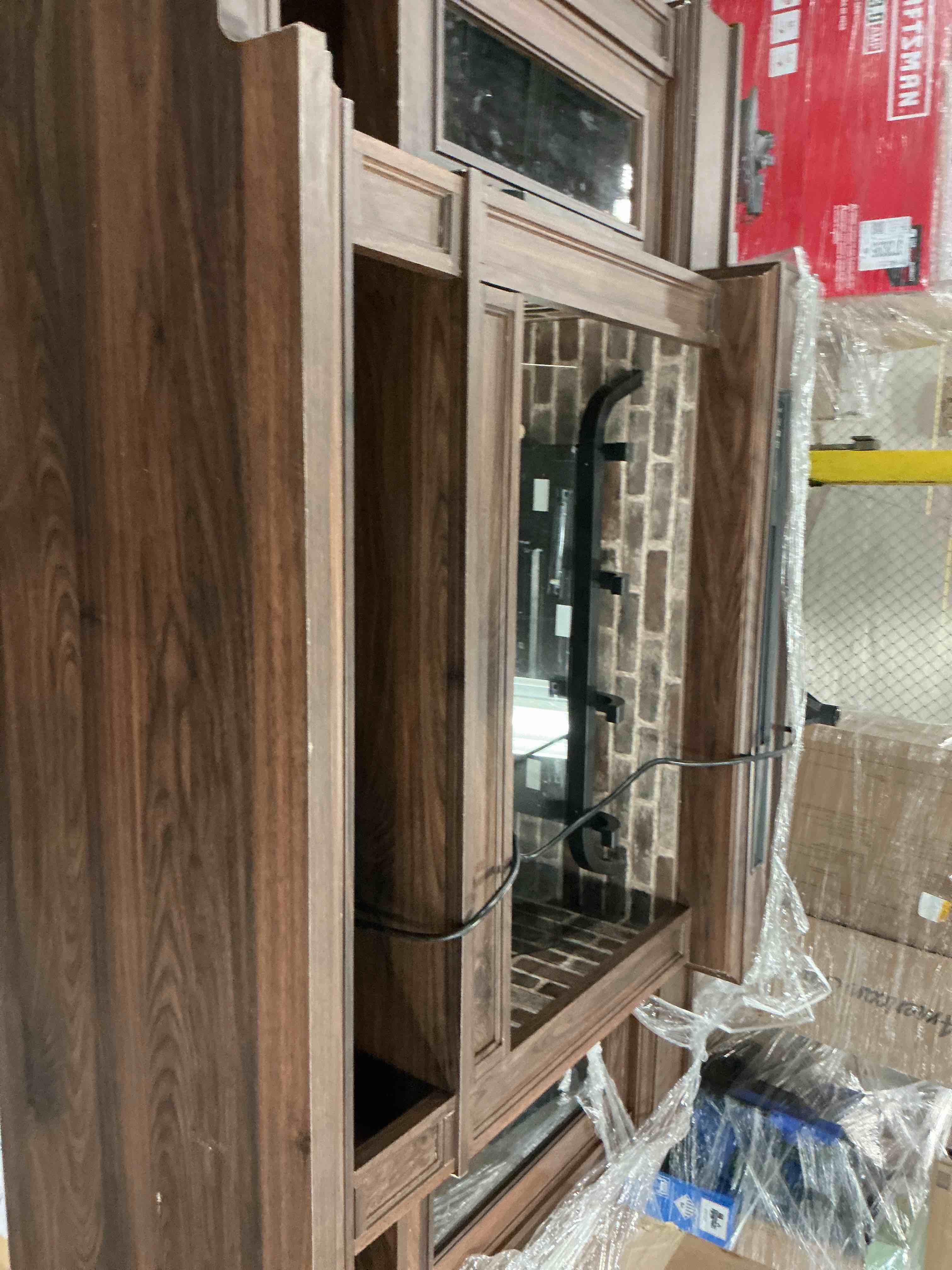 Condition photo showing As Is for allen + roth 66-in w brown walnut tv stand with infrared quartz flat wall electric fireplace 