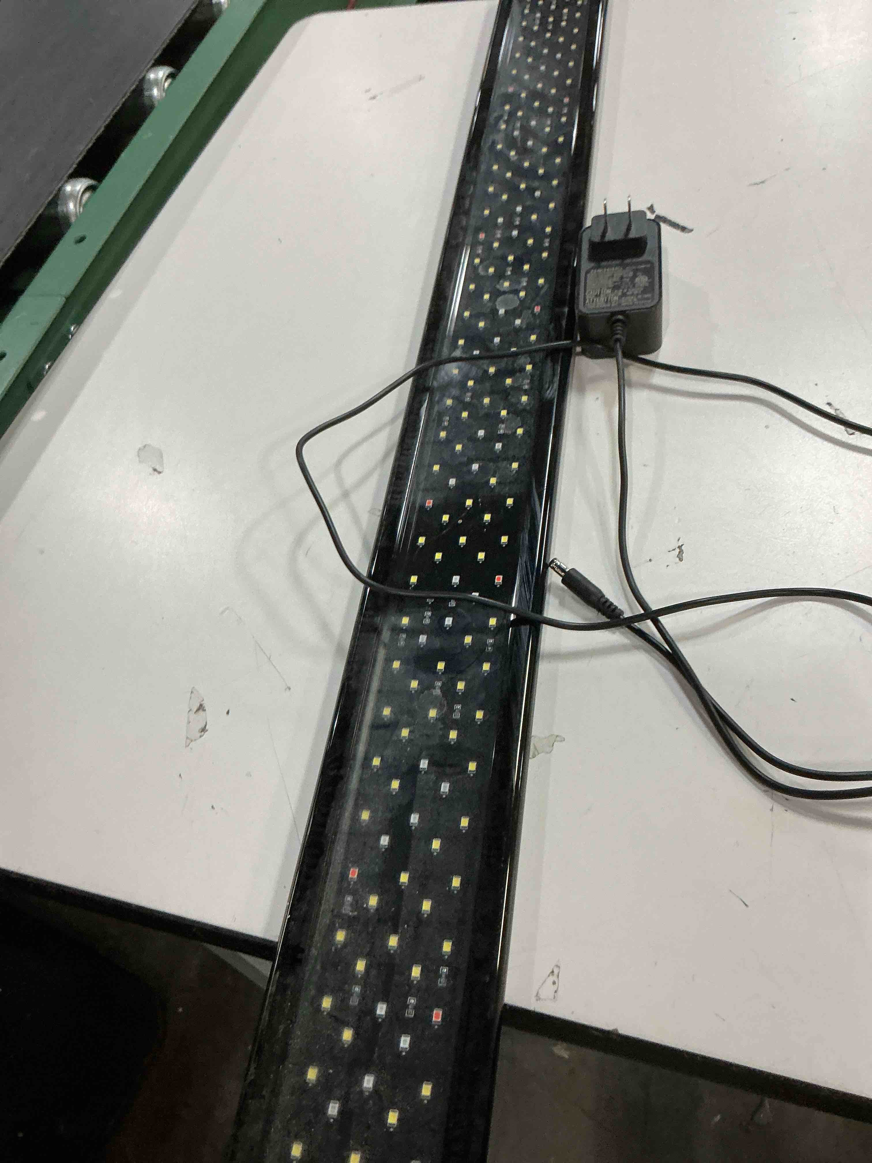 Condition photo showing As Is for pawfly aquarium light for plants, 42 w bluetooth fish tank light, full spectrum aquarium lights for 48"-54" fish tanks, extendable 24/7 led lights with timer modes & adjustable brightness app control 48" to 54"