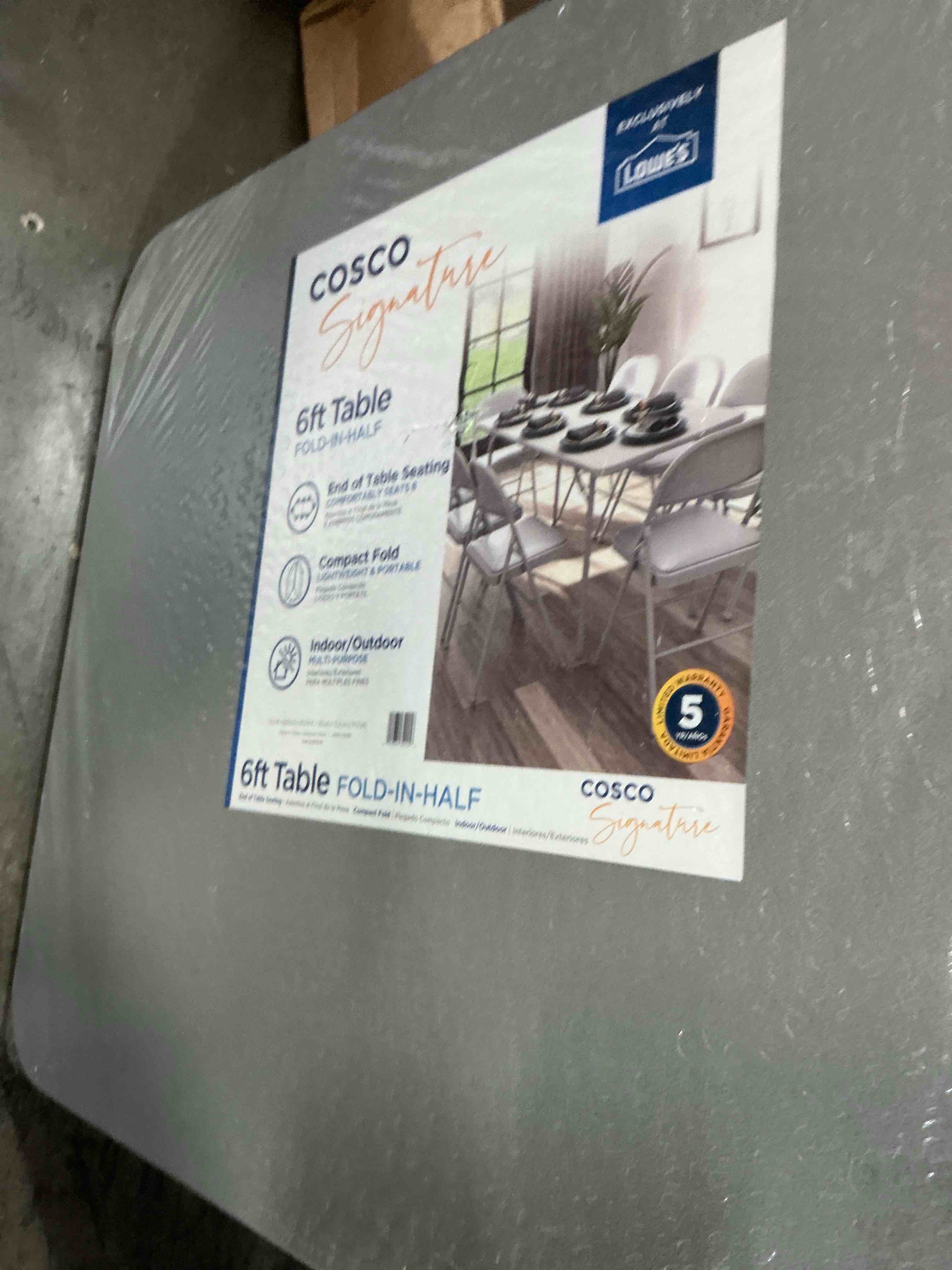 Condition photo showing Good Condition for cosco 2.5-ft x 6-ft fold-in-half indoor or outdoor rectangle resin gray folding banquet