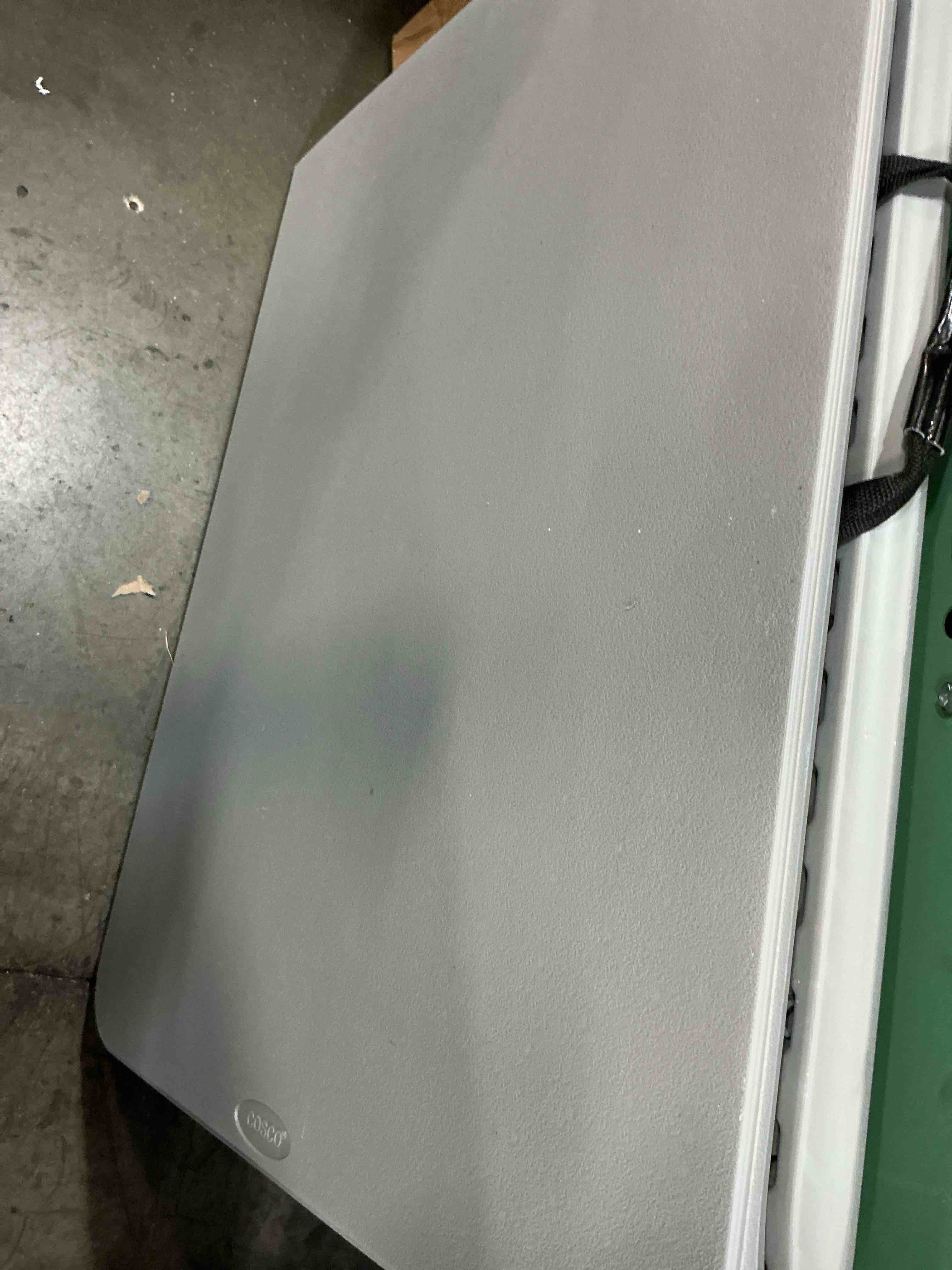 Condition photo showing Good Condition for cosco 2.5-ft x 6-ft fold-in-half indoor or outdoor rectangle resin gray folding banquet